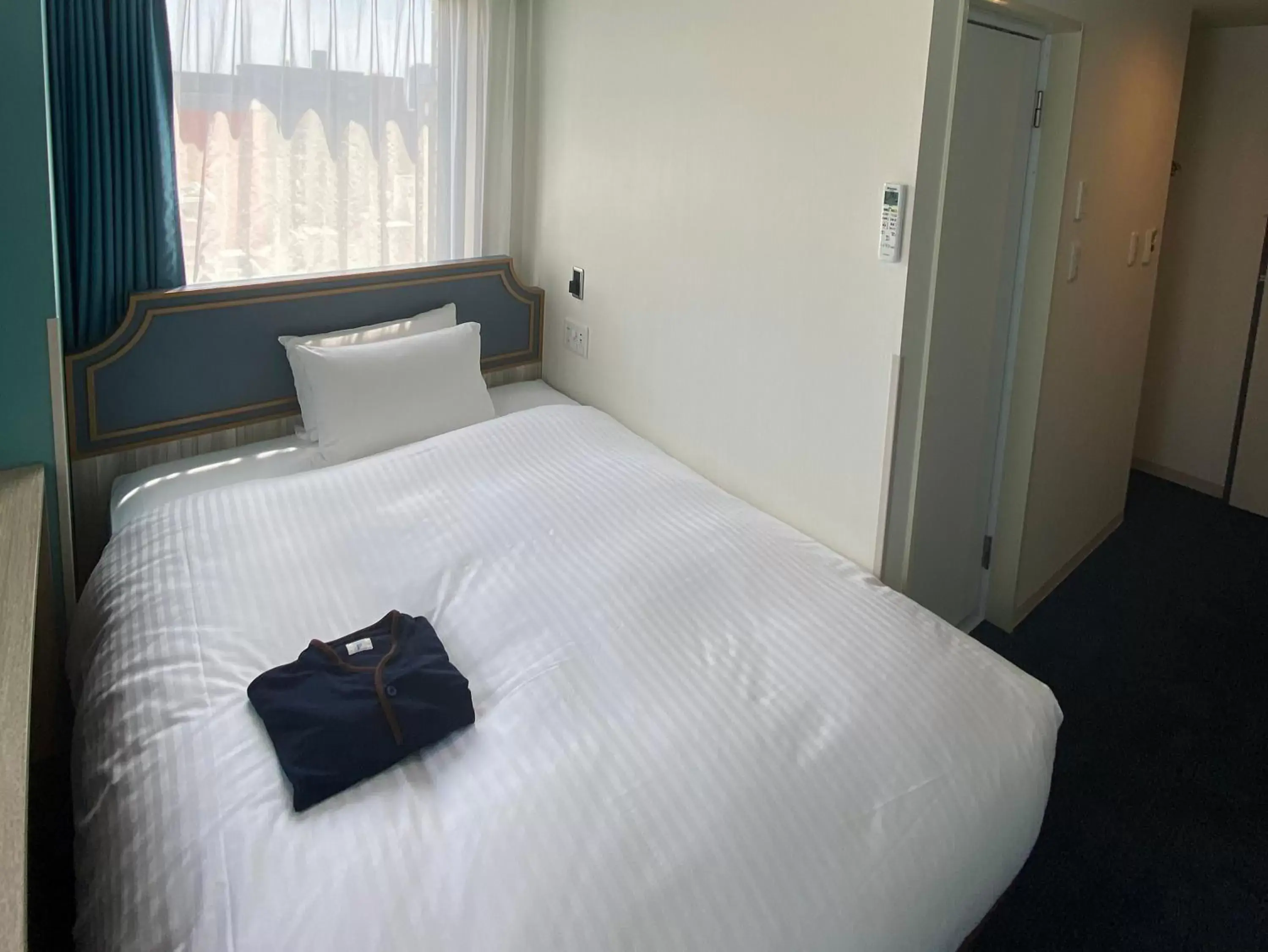 Bed in Hotel Wing International Select Kumamoto