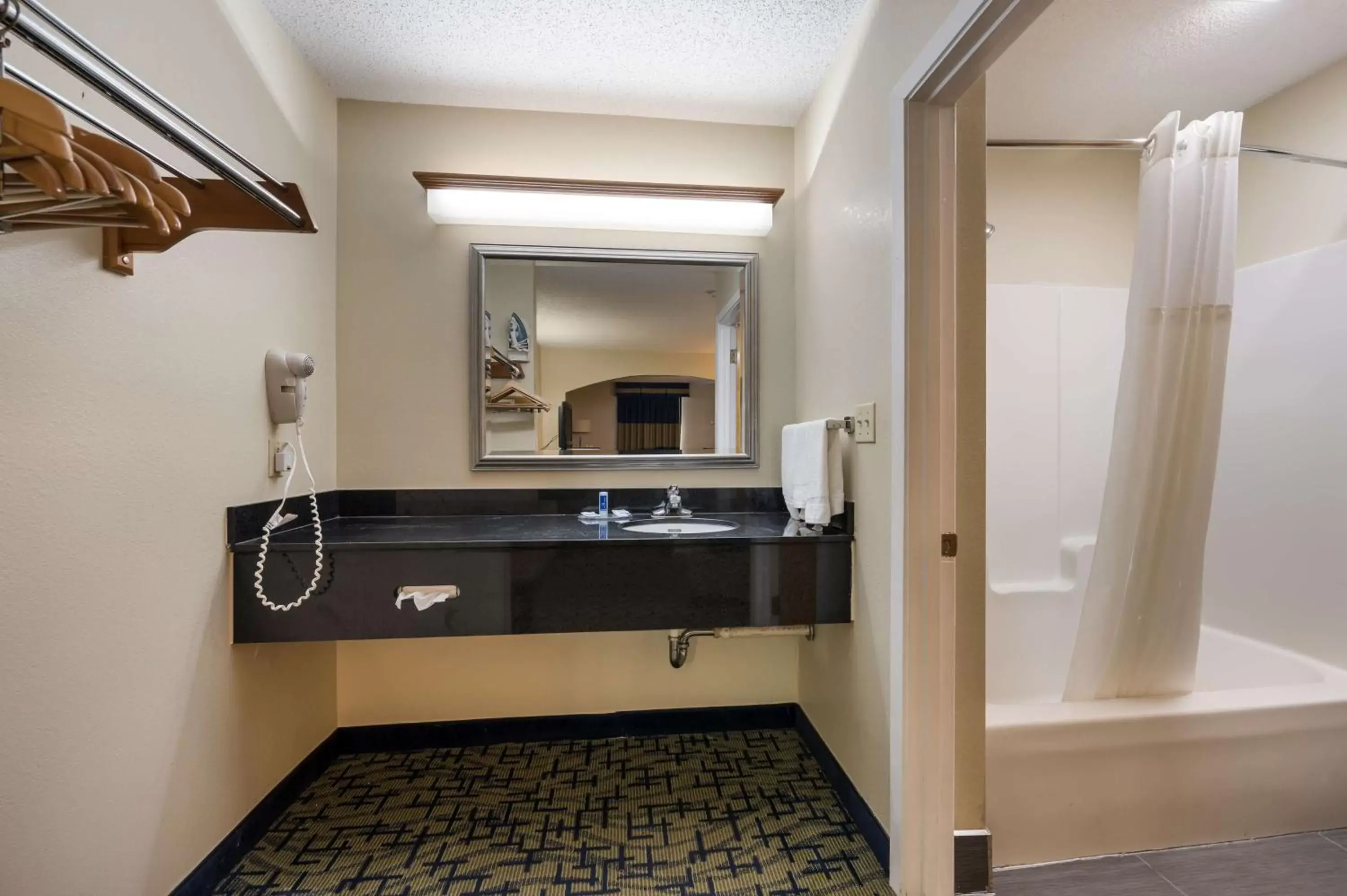 Bathroom in SureStay Hotel by Best Western Meridian