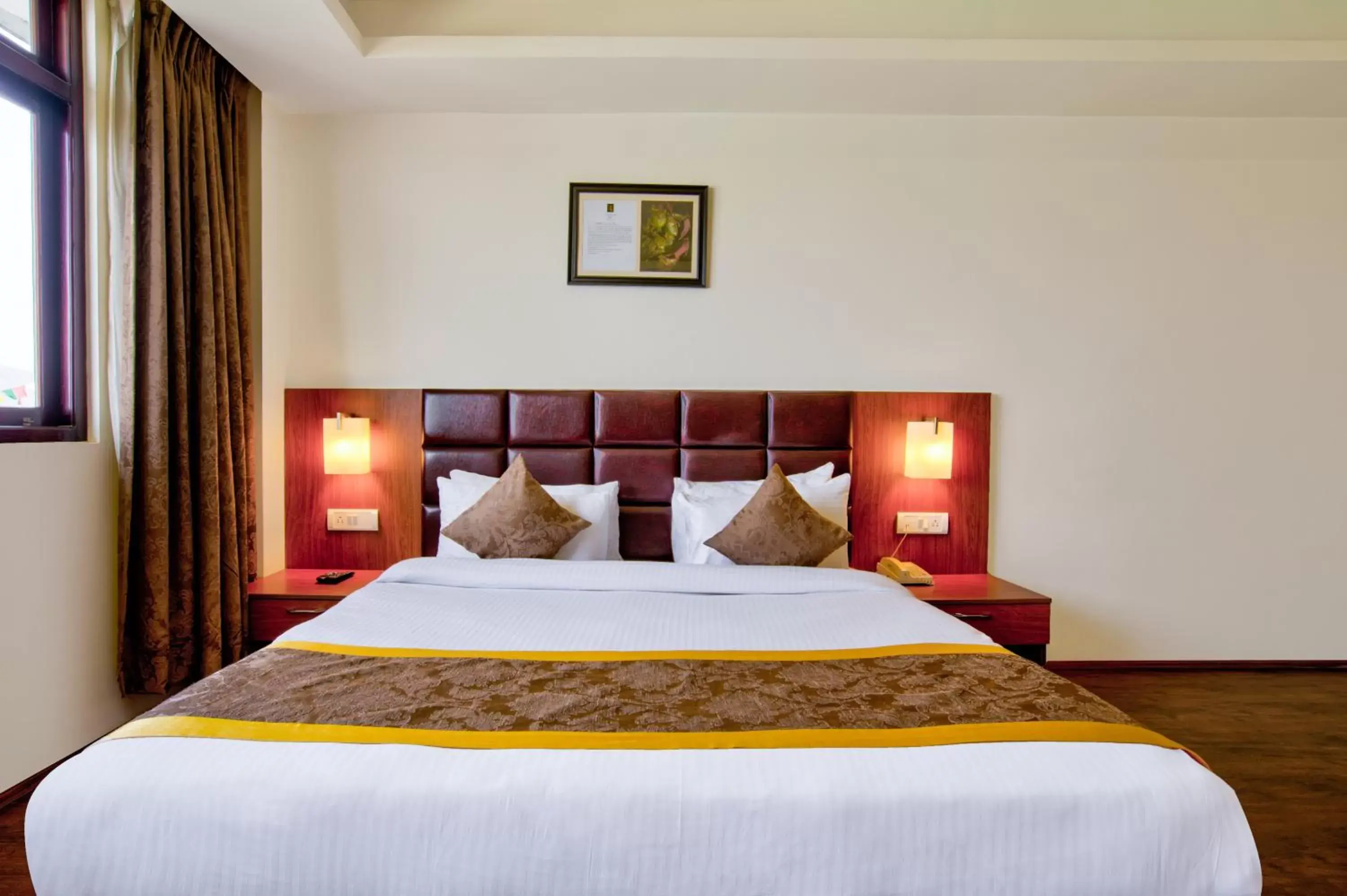 Bed in Summit Ttakshang Residency Hotel & Spa