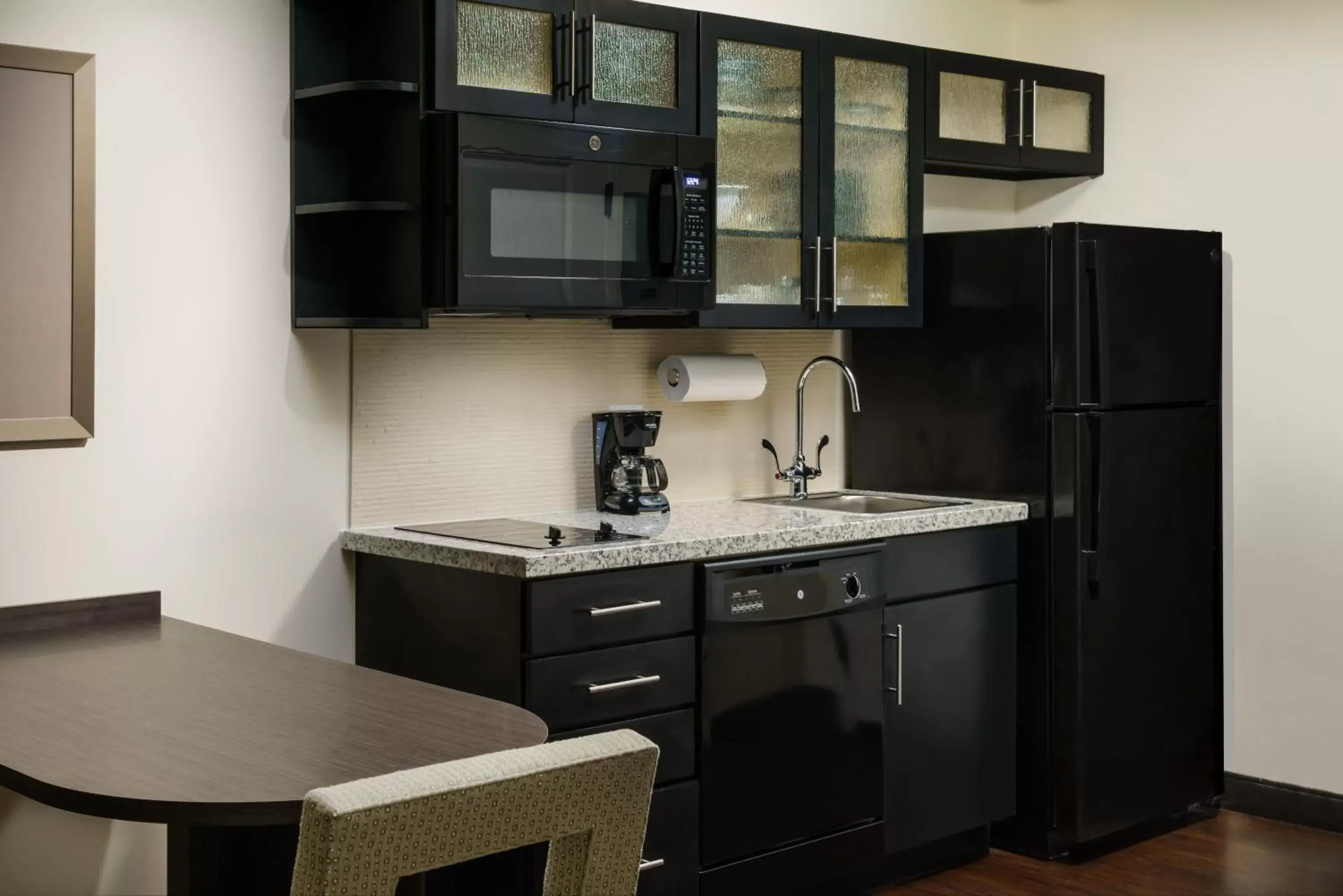 Photo of the whole room, Kitchen/Kitchenette in Candlewood Suites - Orlando - Lake Buena Vista, an IHG Hotel