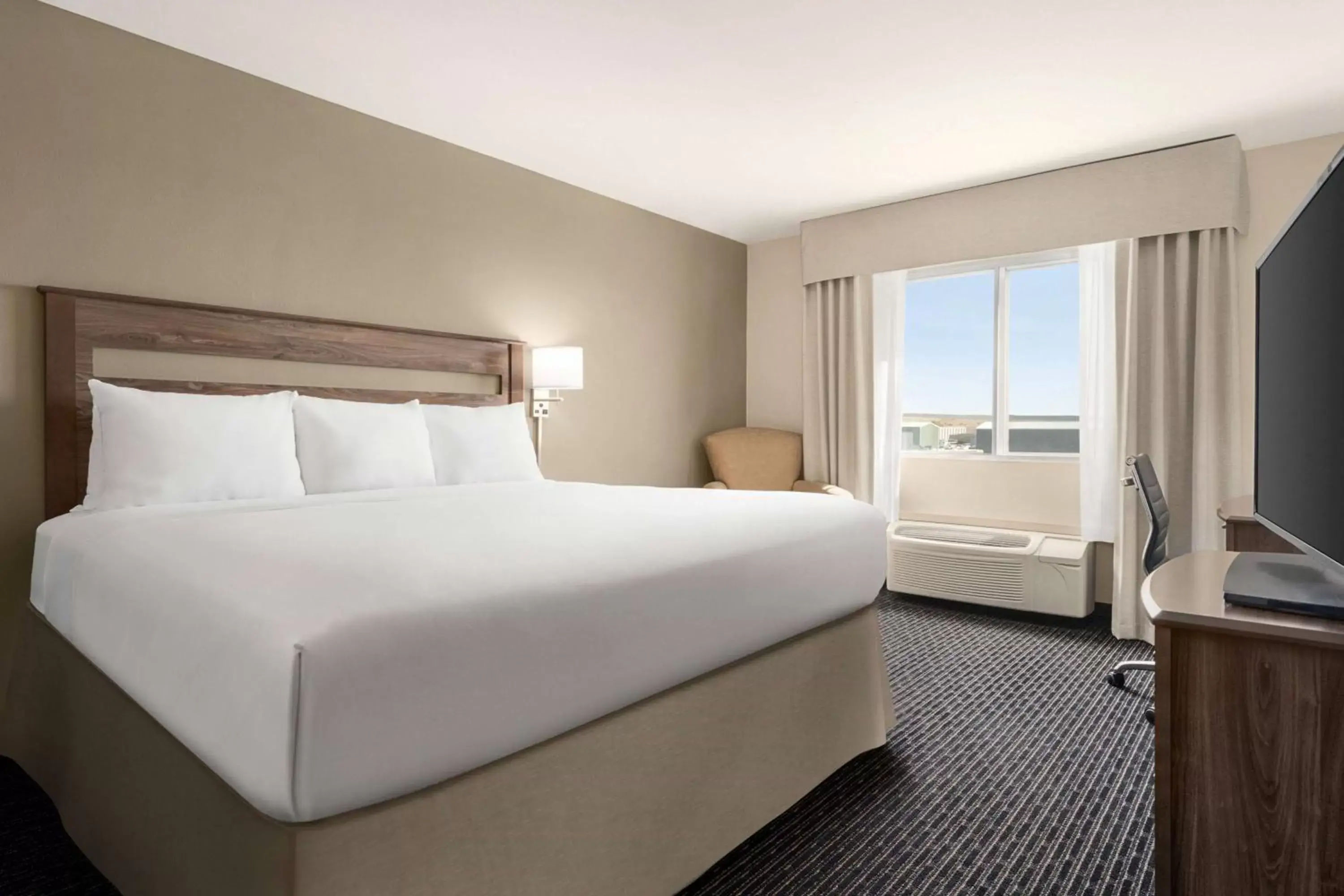 Photo of the whole room, Bed in Baymont by Wyndham Rawlins Photo of the whole room, Bed in Baymont by Wyndham Rawlins