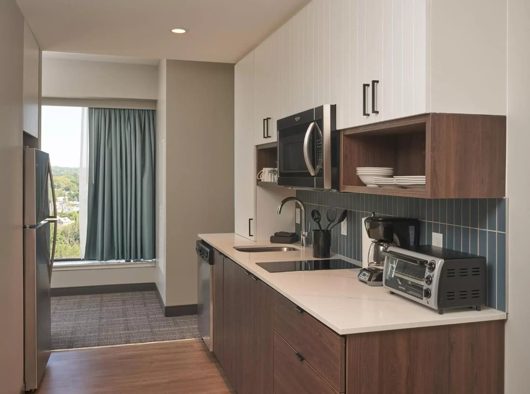 Photo of the whole room, Kitchen/Kitchenette in Staybridge Suites Wilmington Downtown, an IHG Hotel