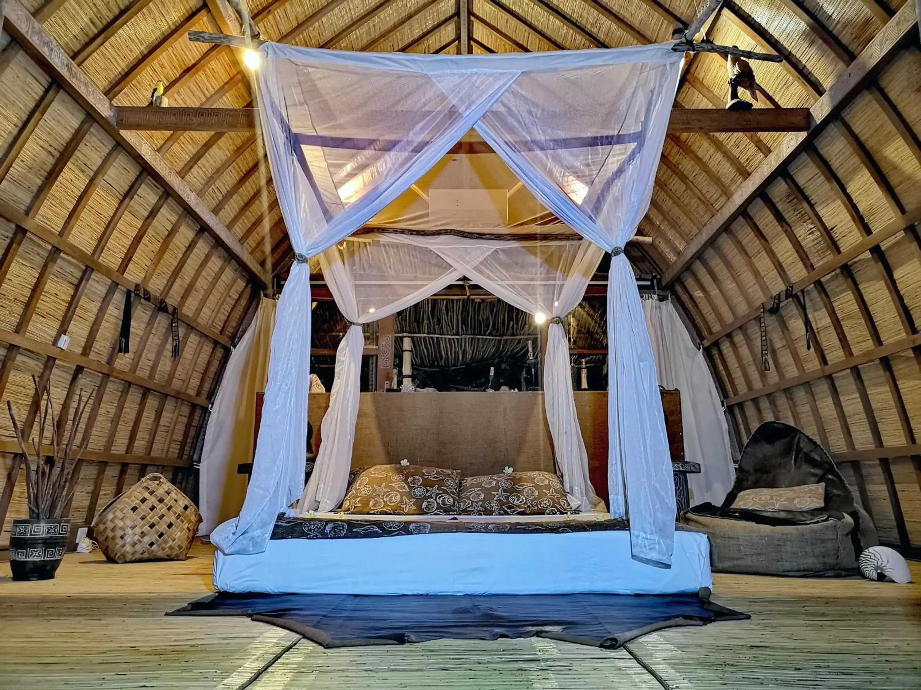 Bed in Coconut Garden Beach Resort
