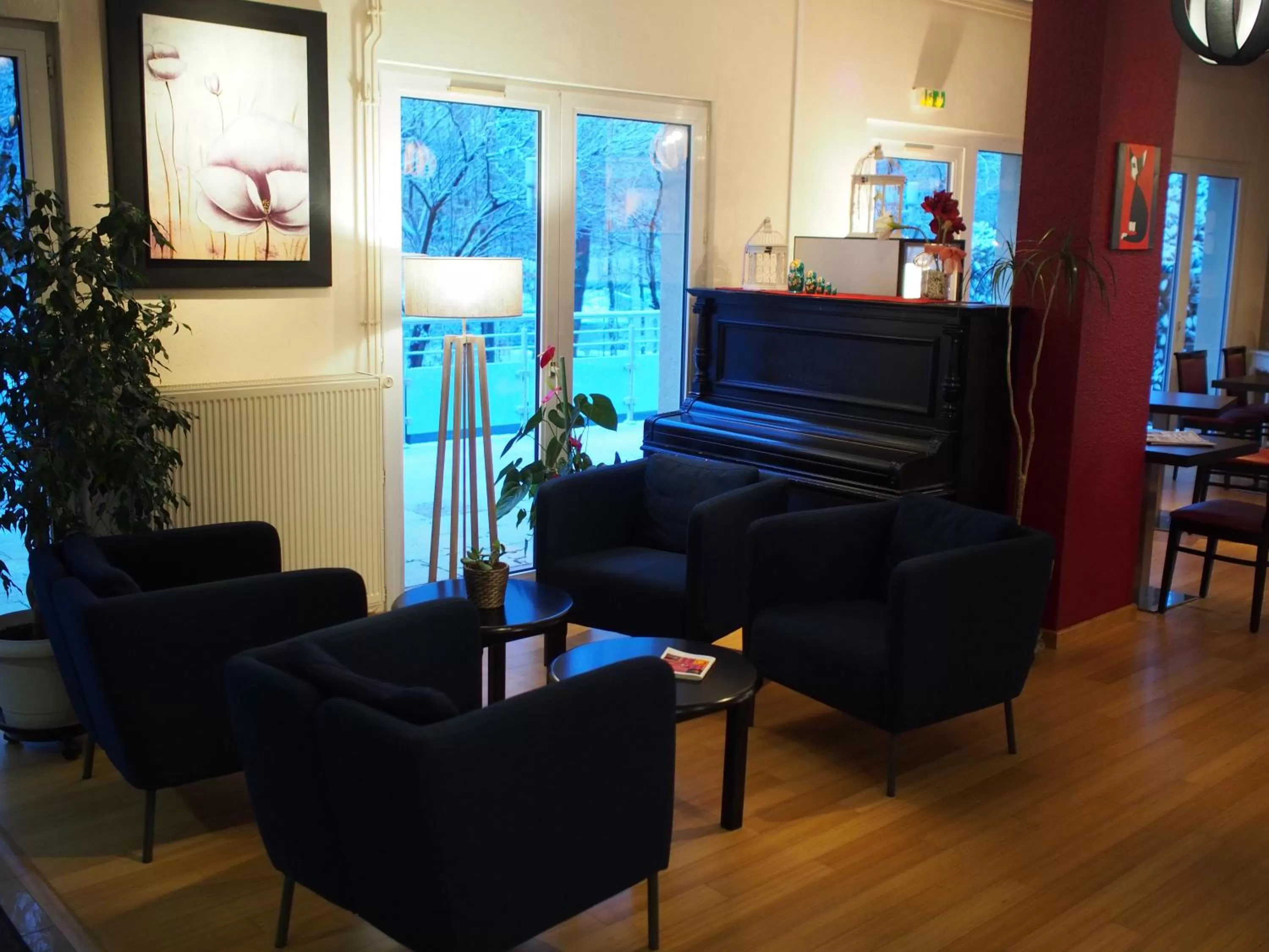 Communal lounge/ TV room in Hôtel et Restaurant Aster, Saint-Avold Nord