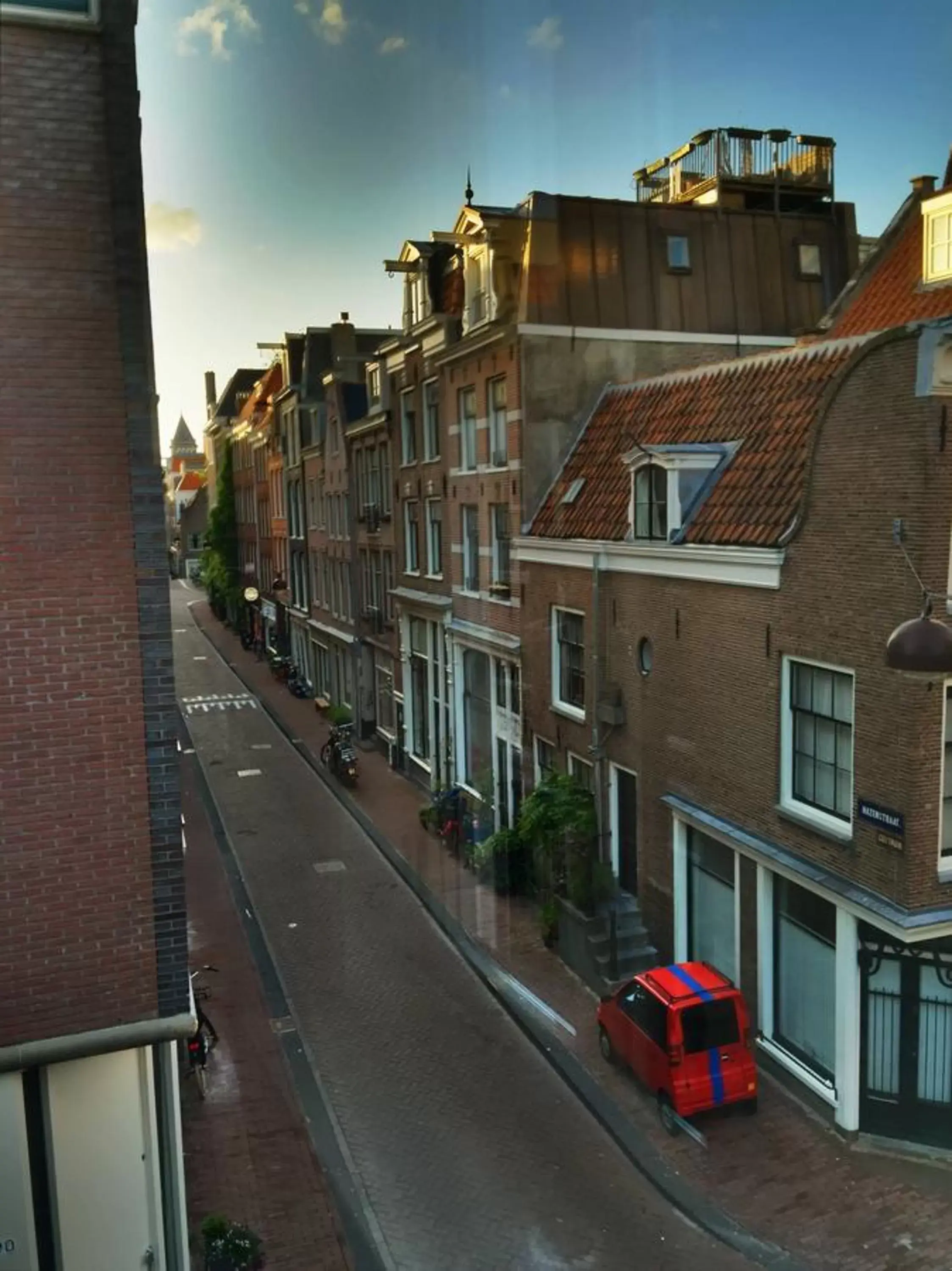 Street view in Jordaan Suite bed and bubbles