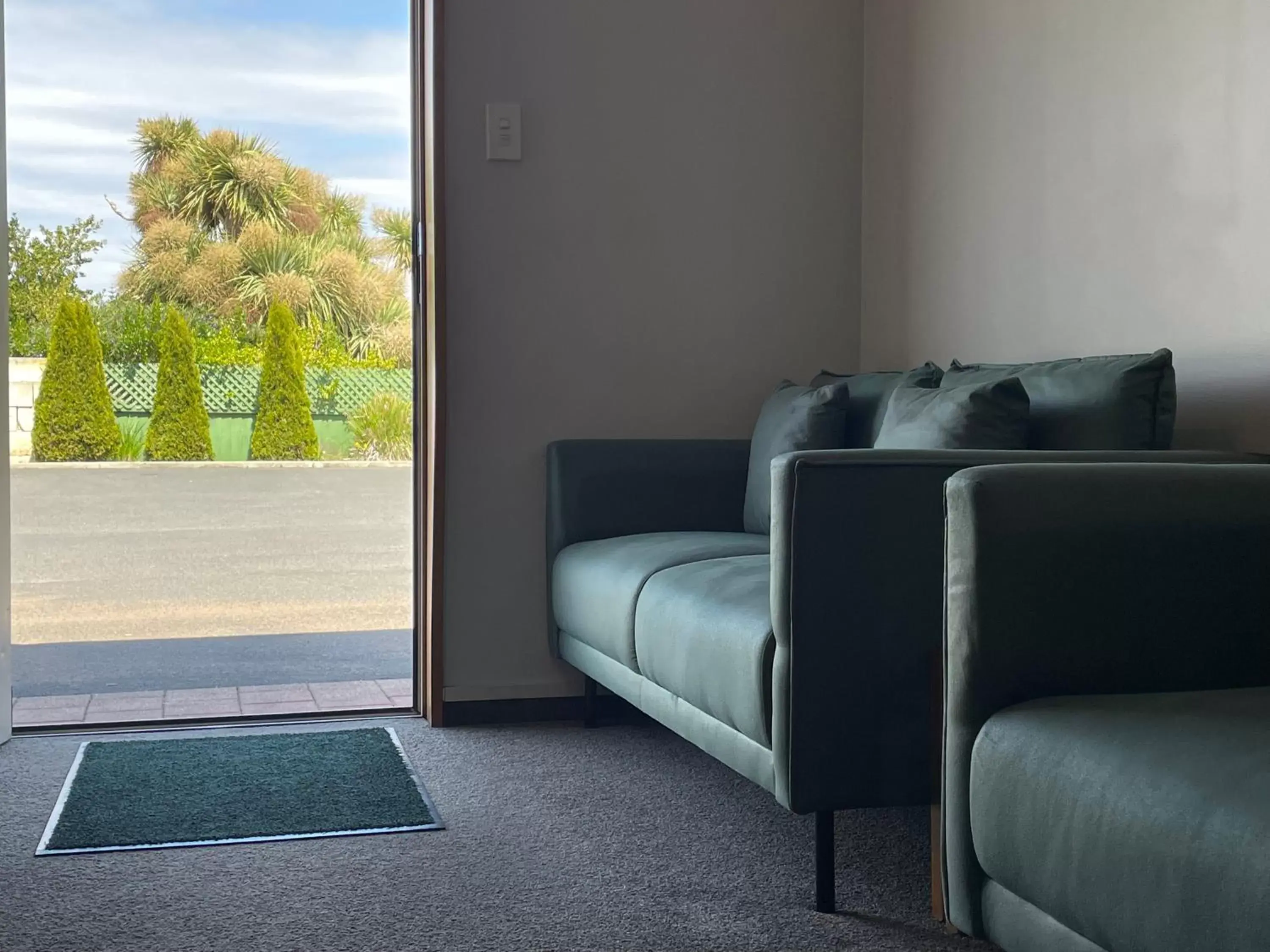 Seating Area in ASURE Ambassador Motor Lodge