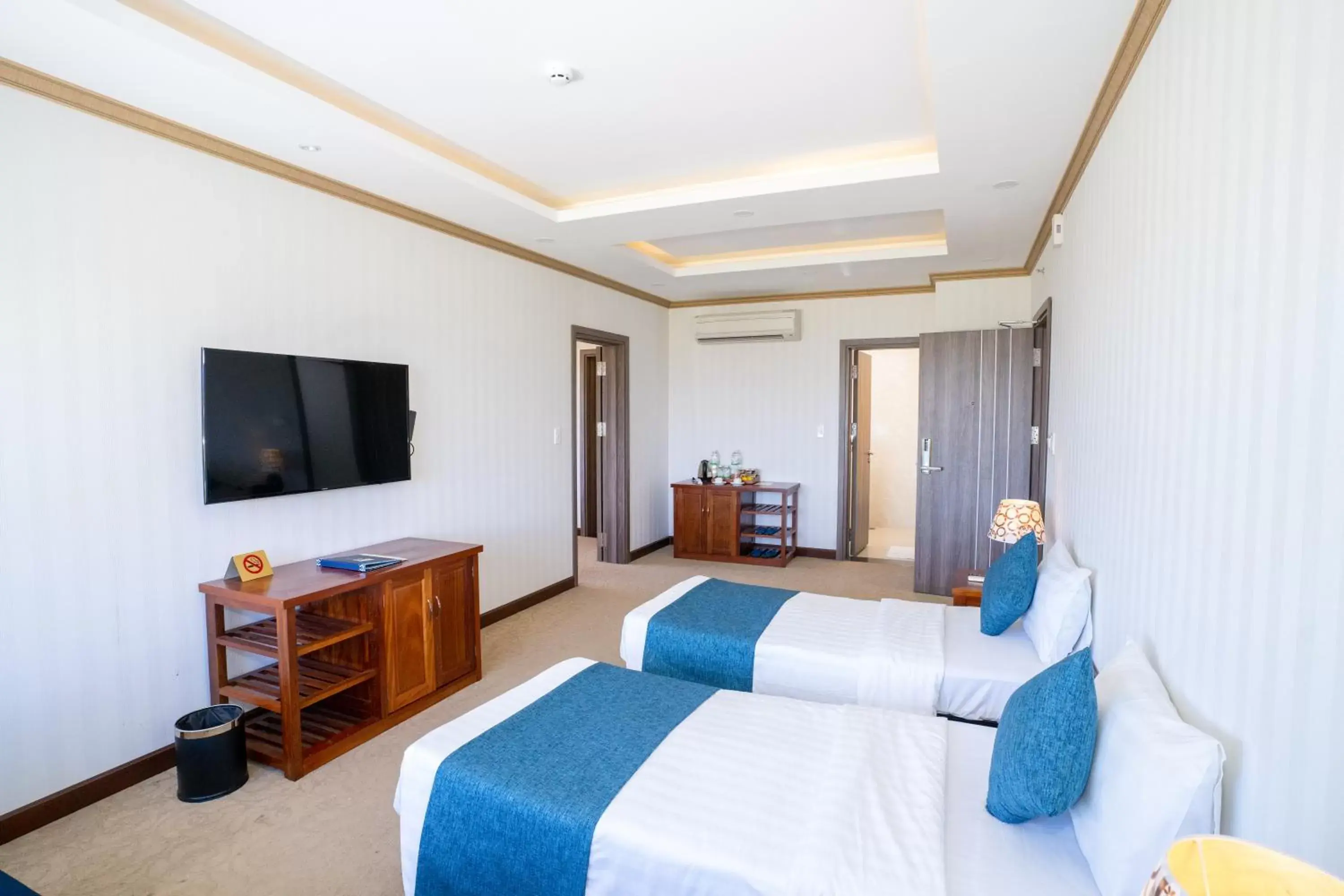 Bed, TV/Entertainment Center in Navy Hotel Cam Ranh