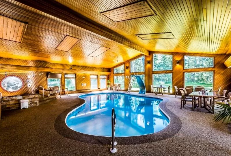 Patio, Swimming Pool in Rustlers Lodge