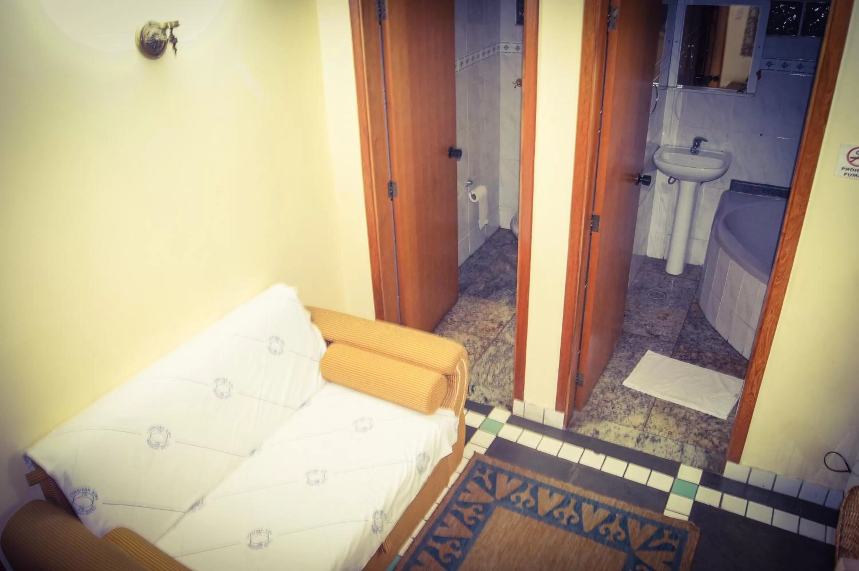 Bedroom in Cumbipar King Hotel