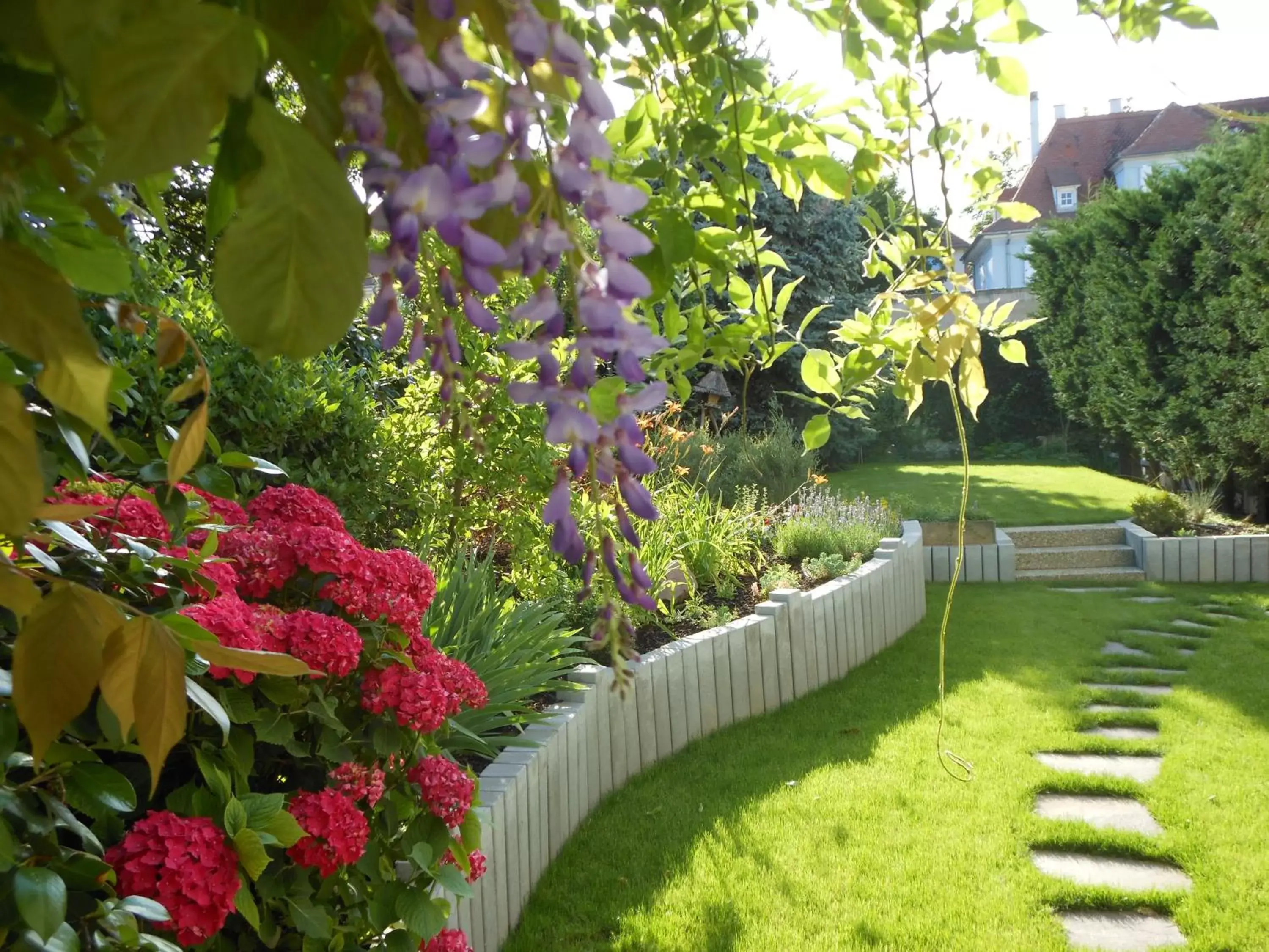 Garden in Logis Hôtel Beauséjour Colmar