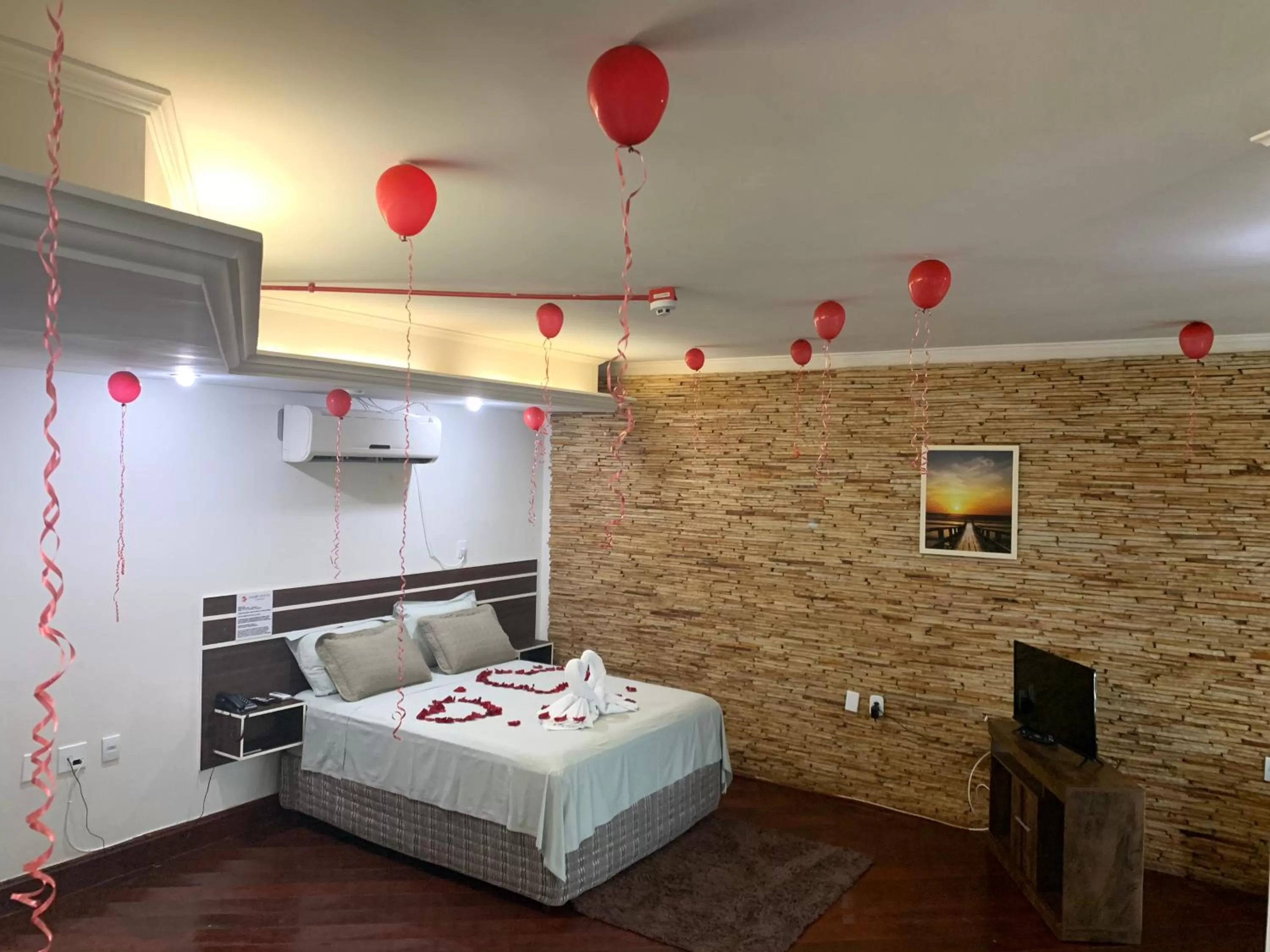 Bed in SAMIR HOTEL COMFORT