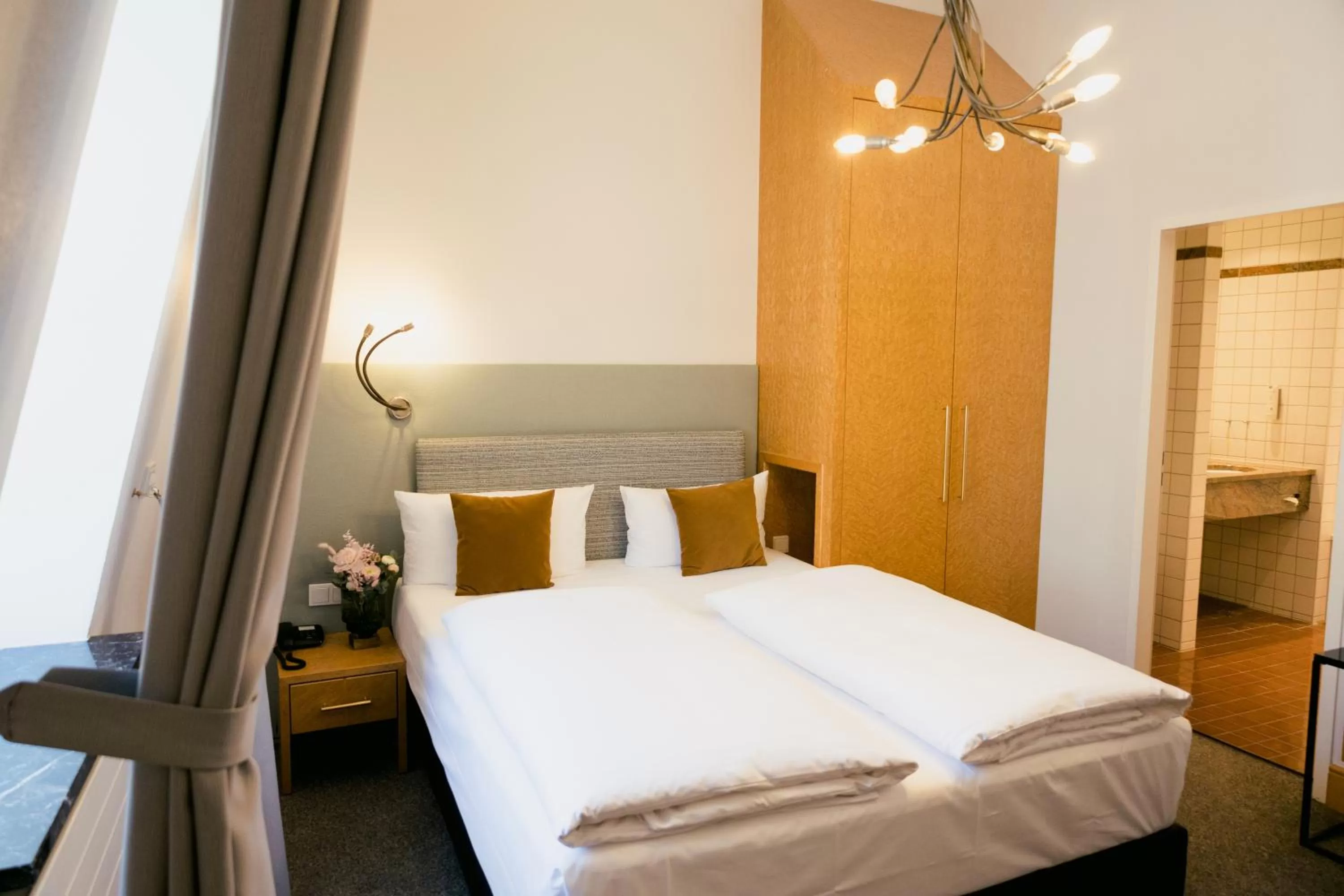 Photo of the whole room, Bed in DOM Hotel LIMBURG