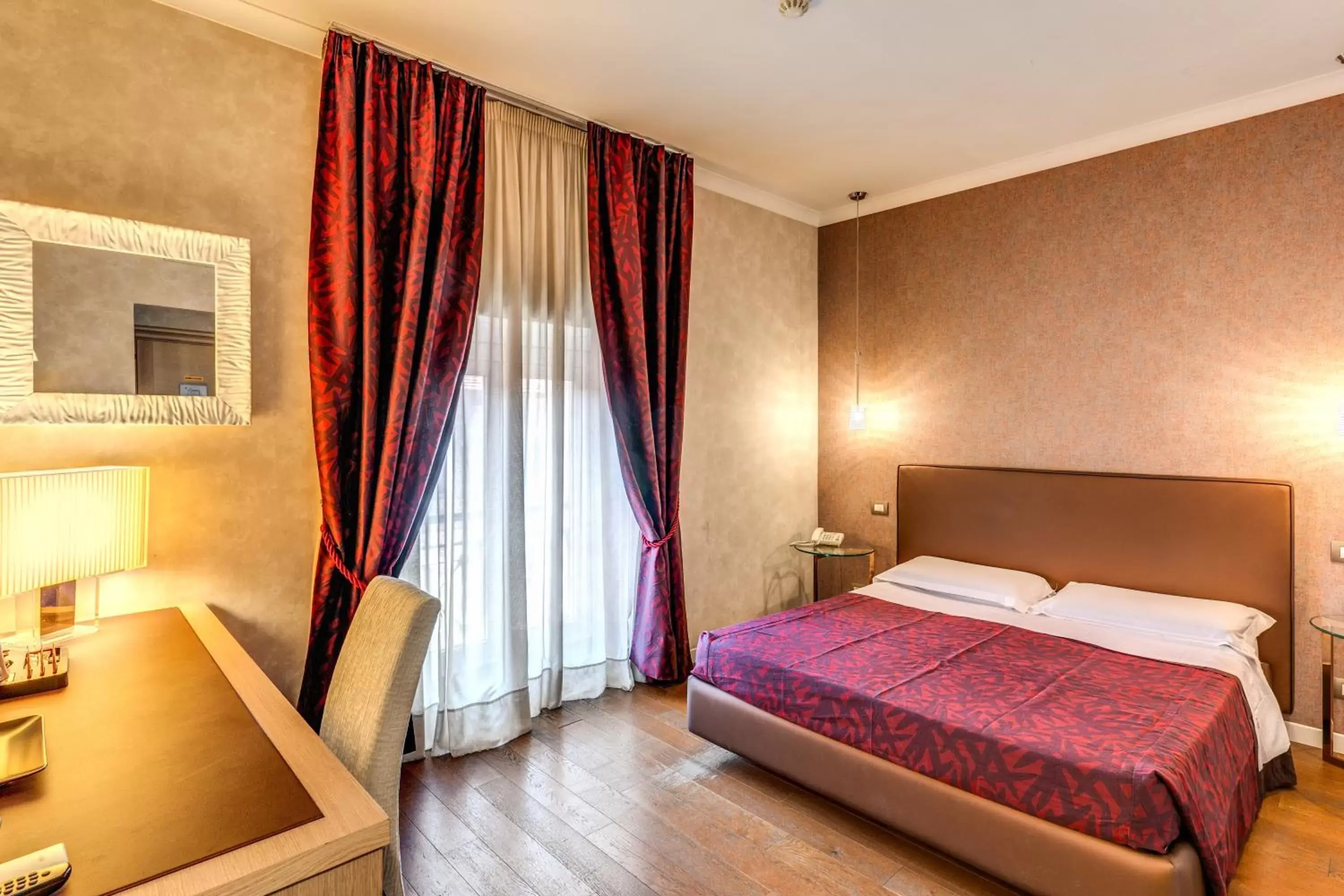Bed in Roma Boutique Hotel