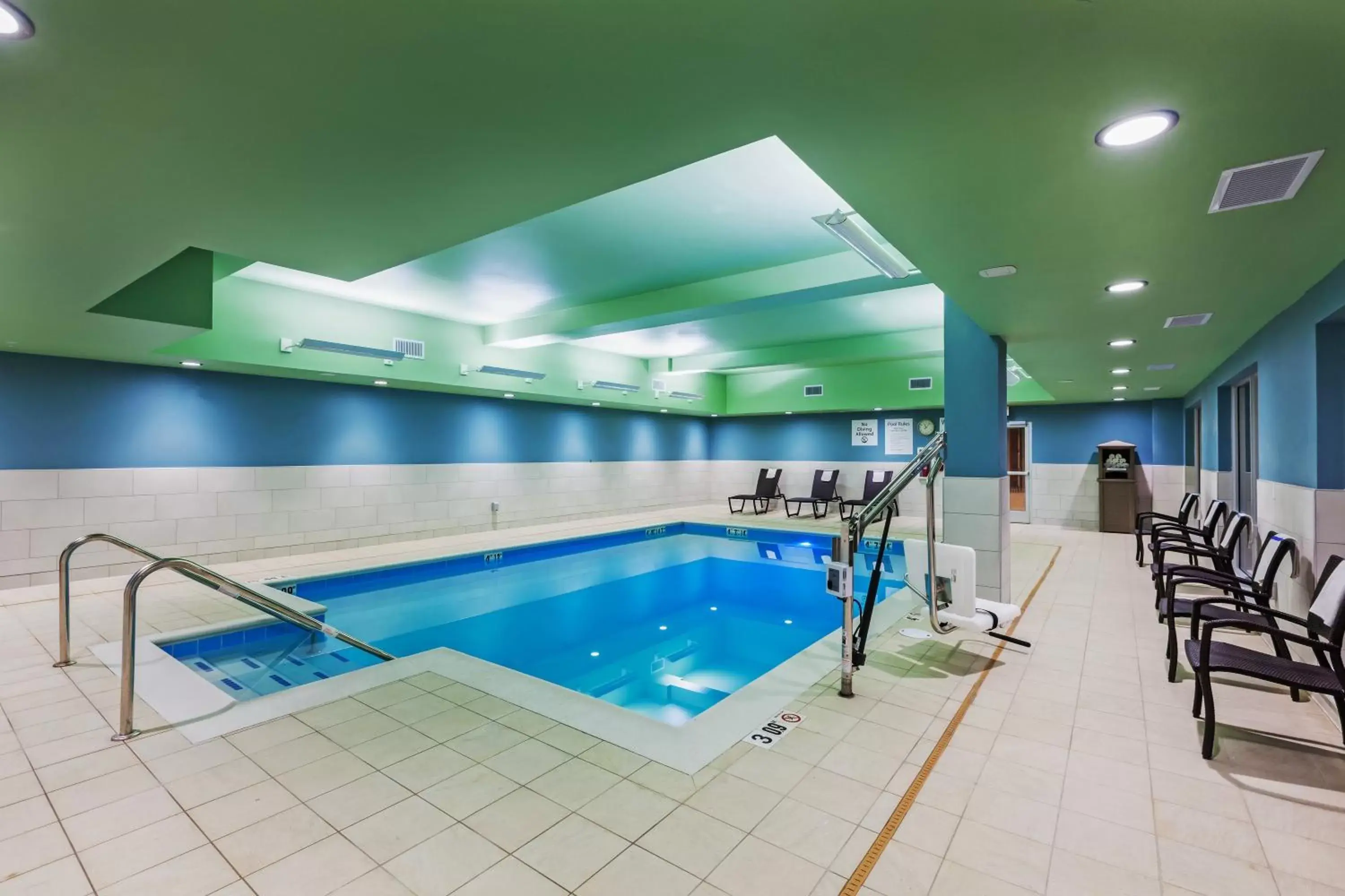 Swimming Pool in Holiday Inn Express and Suites Chanute, an IHG Hotel