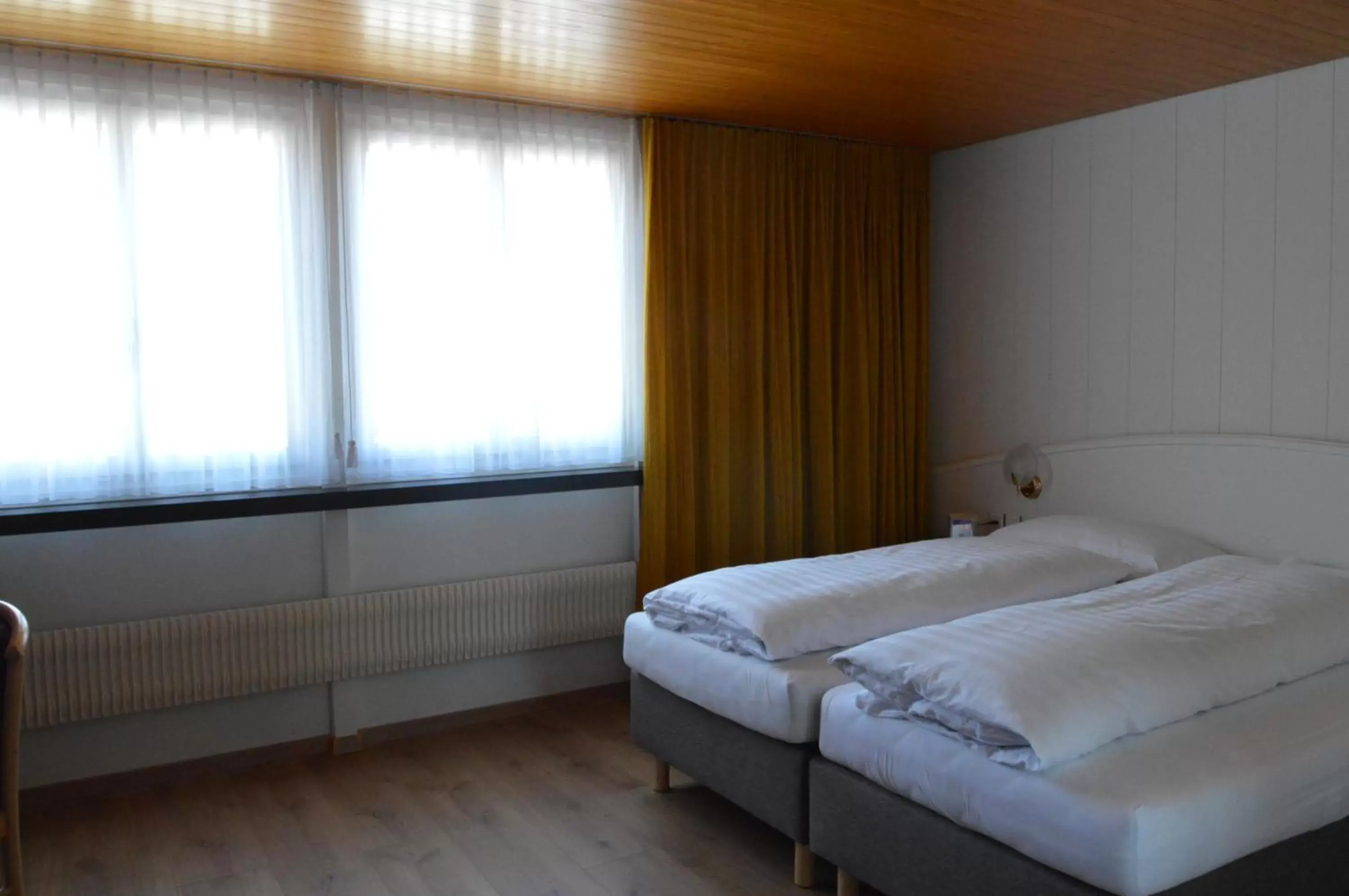 Photo of the whole room, Bed in Hotel Garni Rösslipost