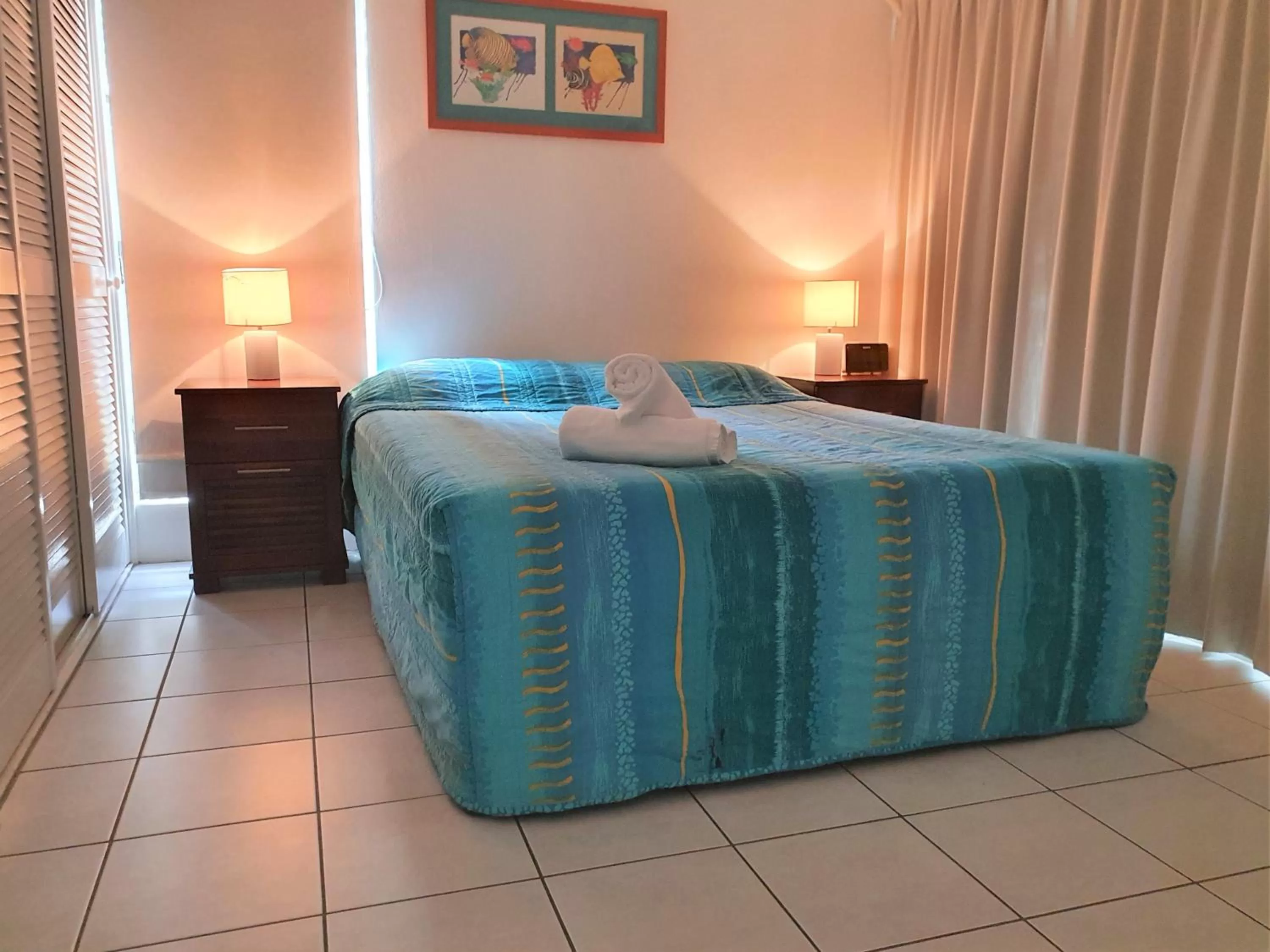 Bed in Mango Tree Holiday Apartments