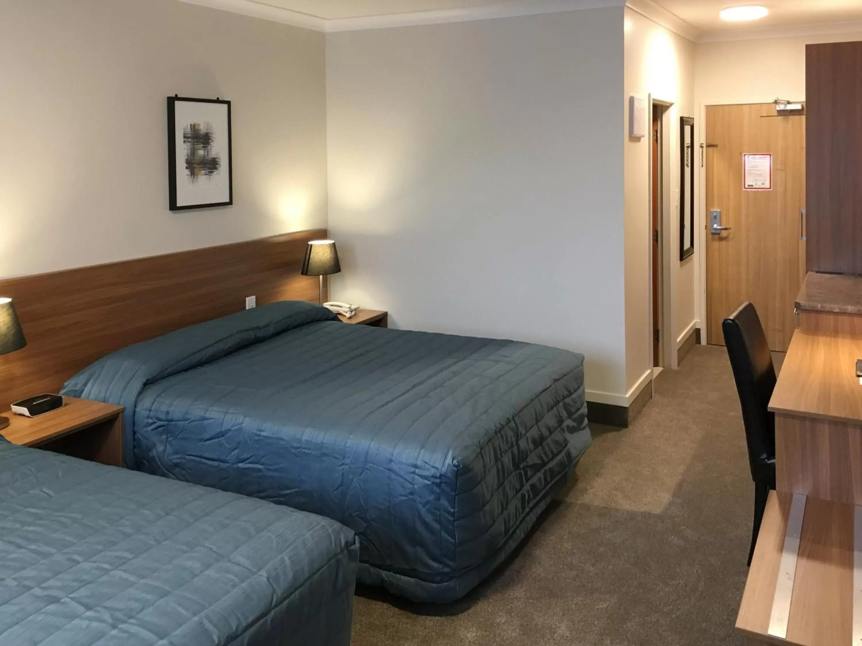 Bed in The Victoria Hotel Dunedin