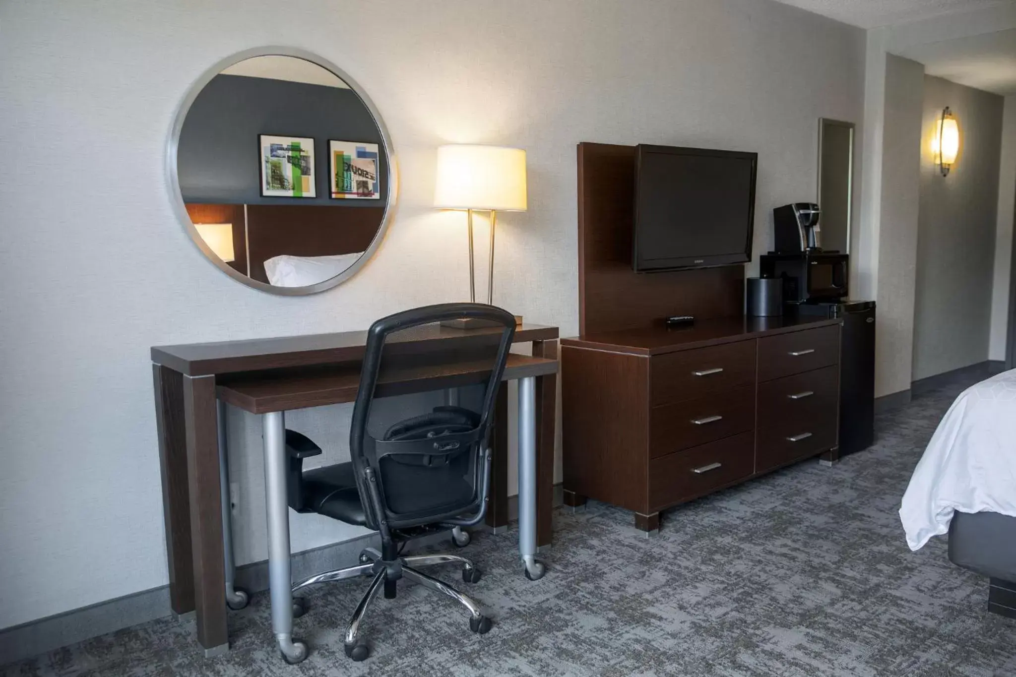 Photo of the whole room, TV/Entertainment Center in Holiday Inn Sioux Falls-City Center, an IHG Hotel
