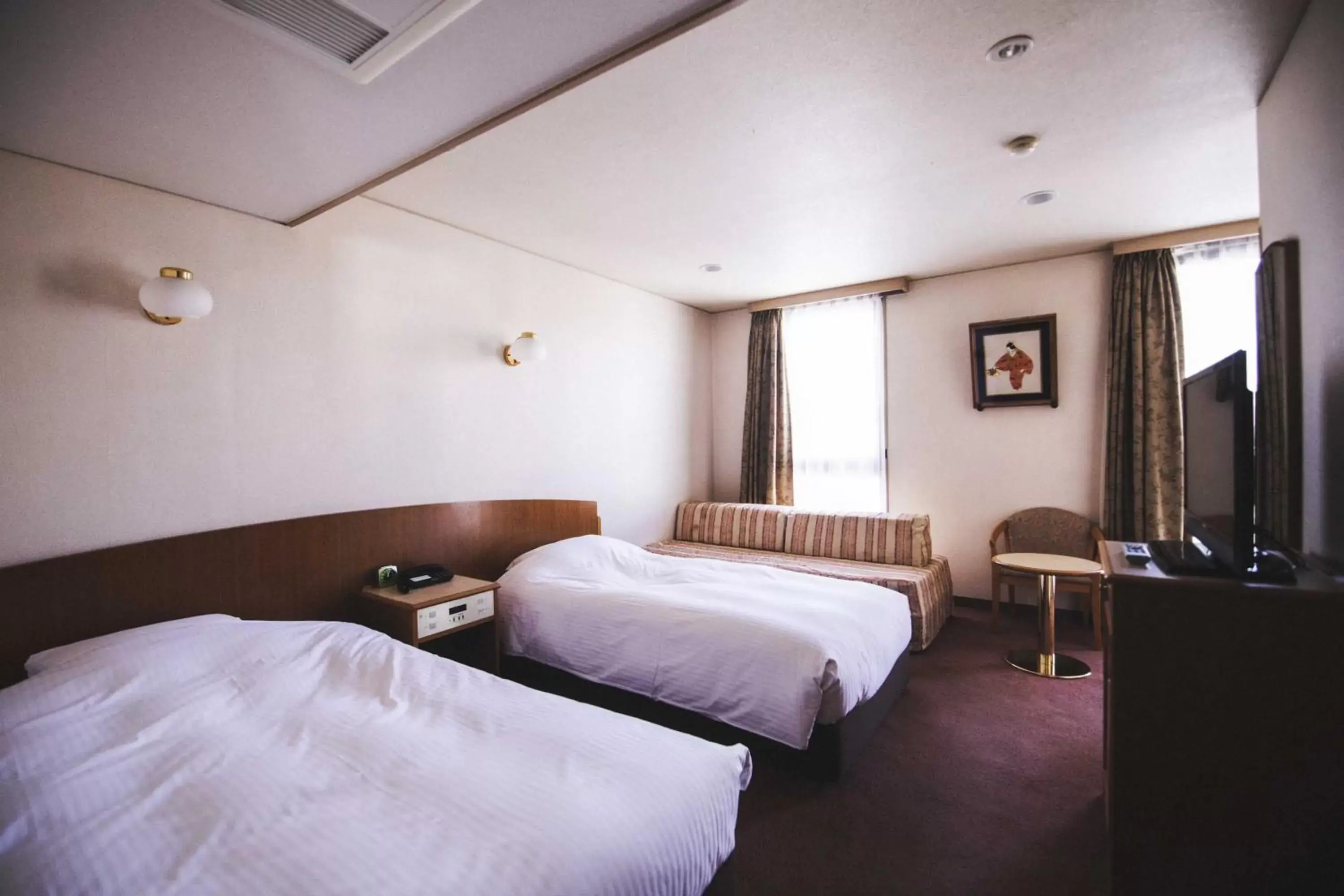 Bed in Hotel Kajiwara