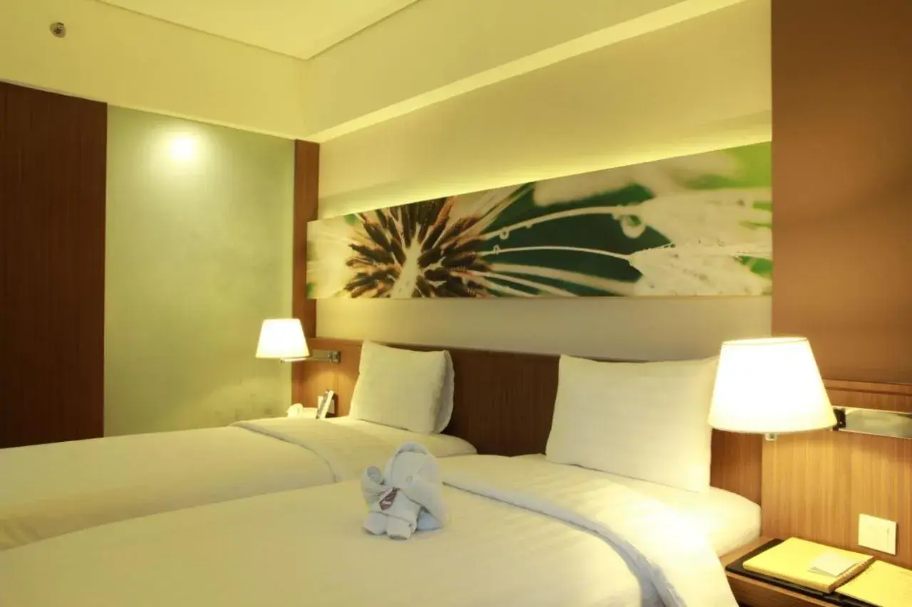 Bed in Soll Marina Hotel Serpong