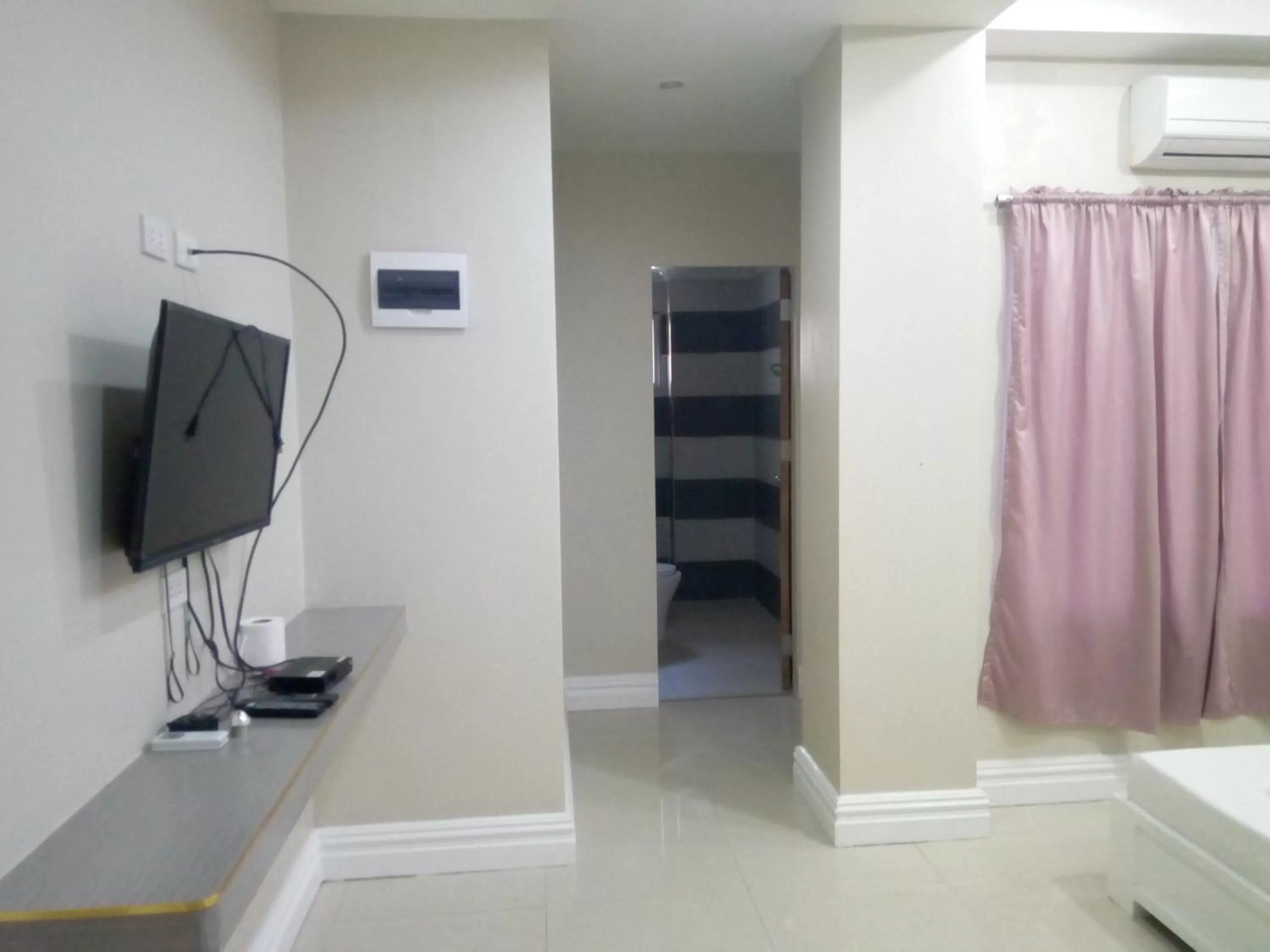 Bed in Sandscape Hotel