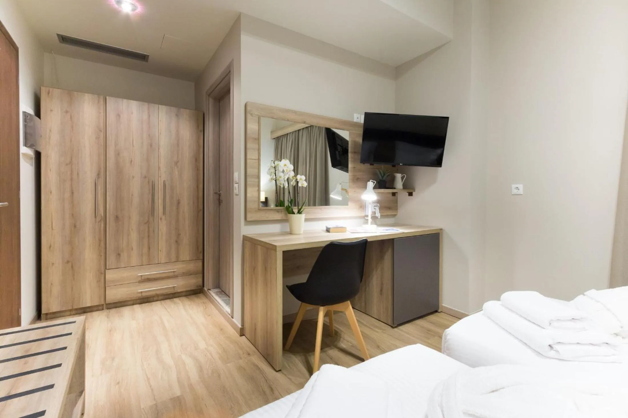 Photo of the whole room, Bed in Hotel @Syngrou Fix