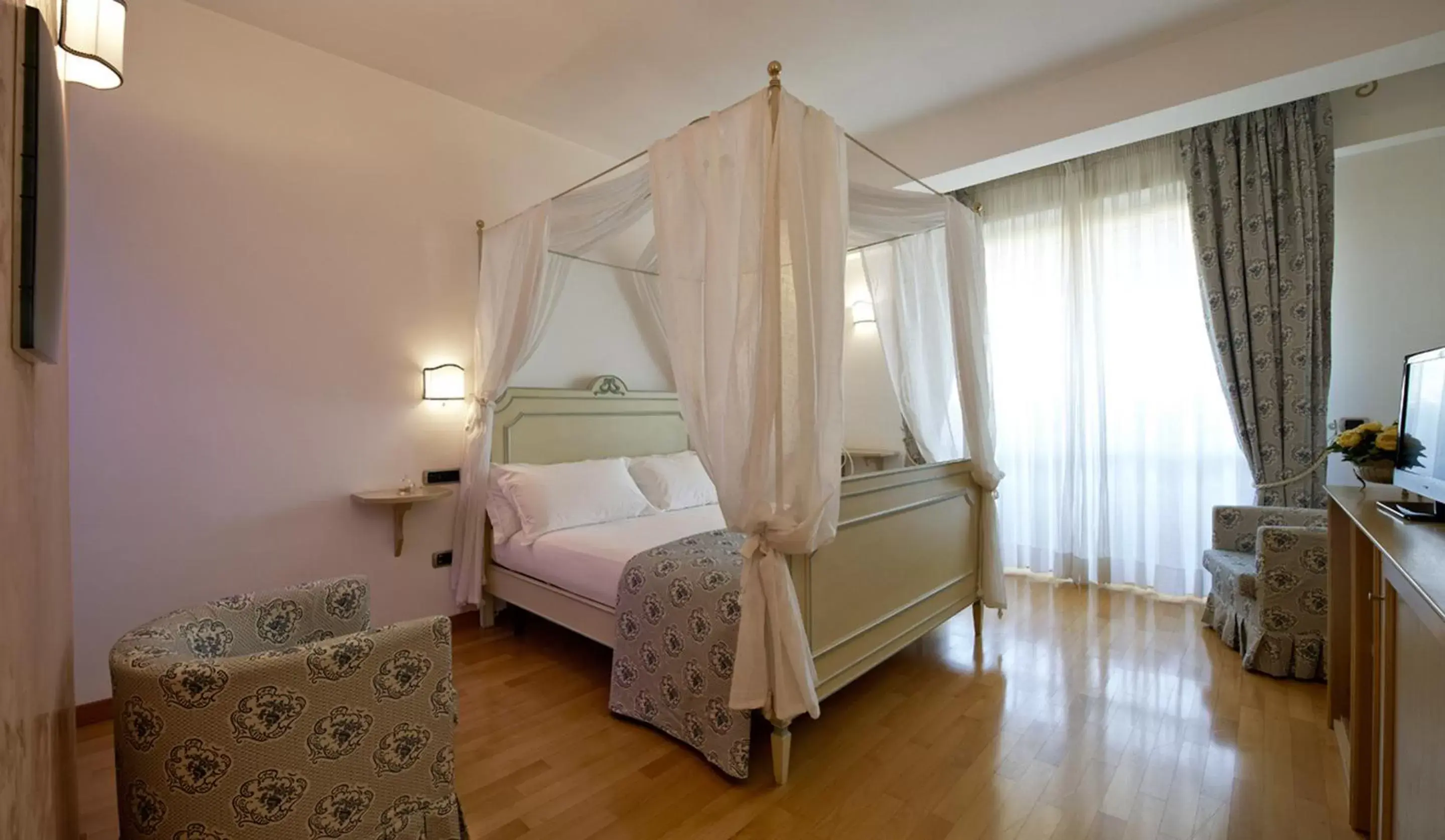 Bed in Hotel Villa Poseidon & Events