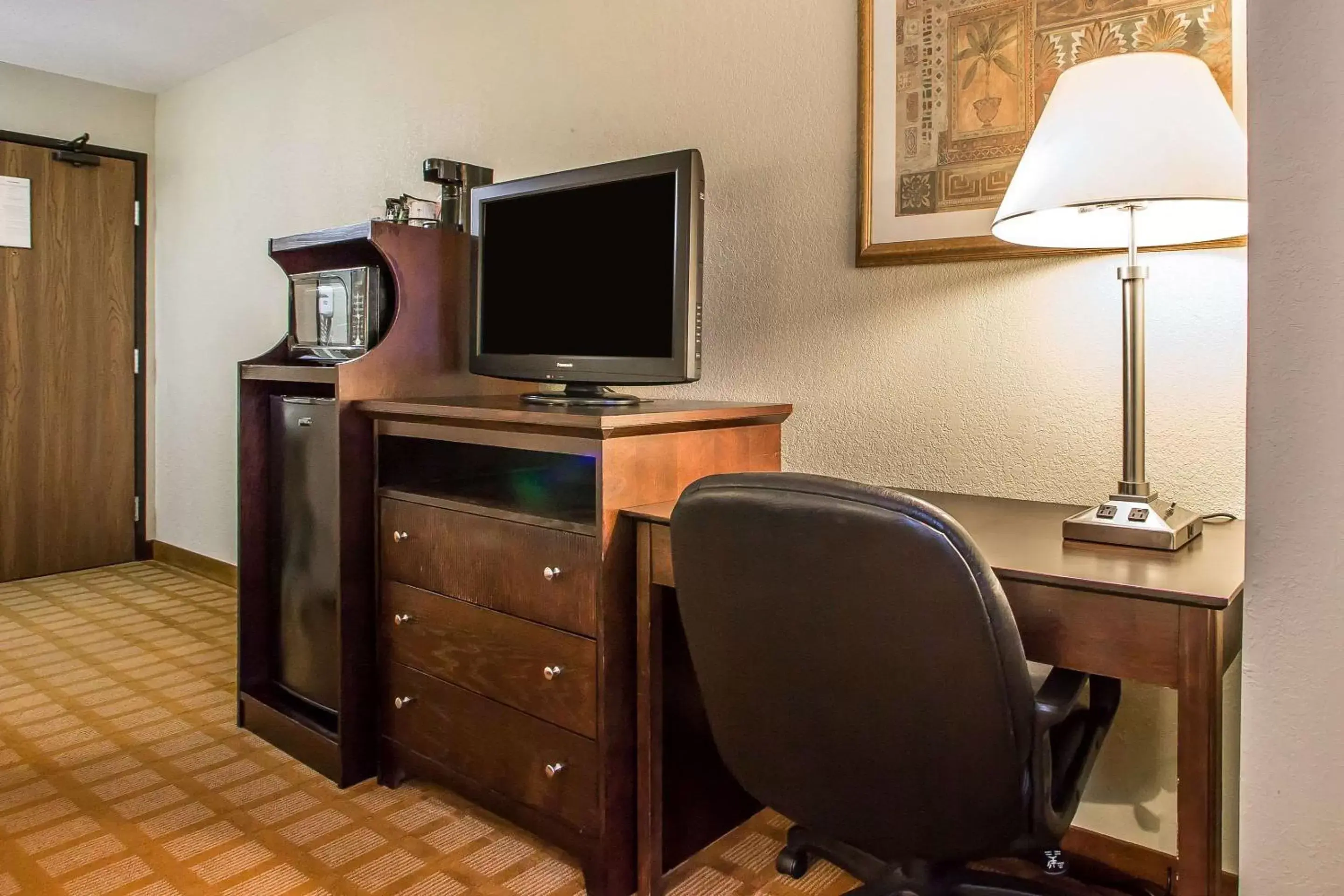 Photo of the whole room, TV/Entertainment Center in Quality Inn & Suites Marinette