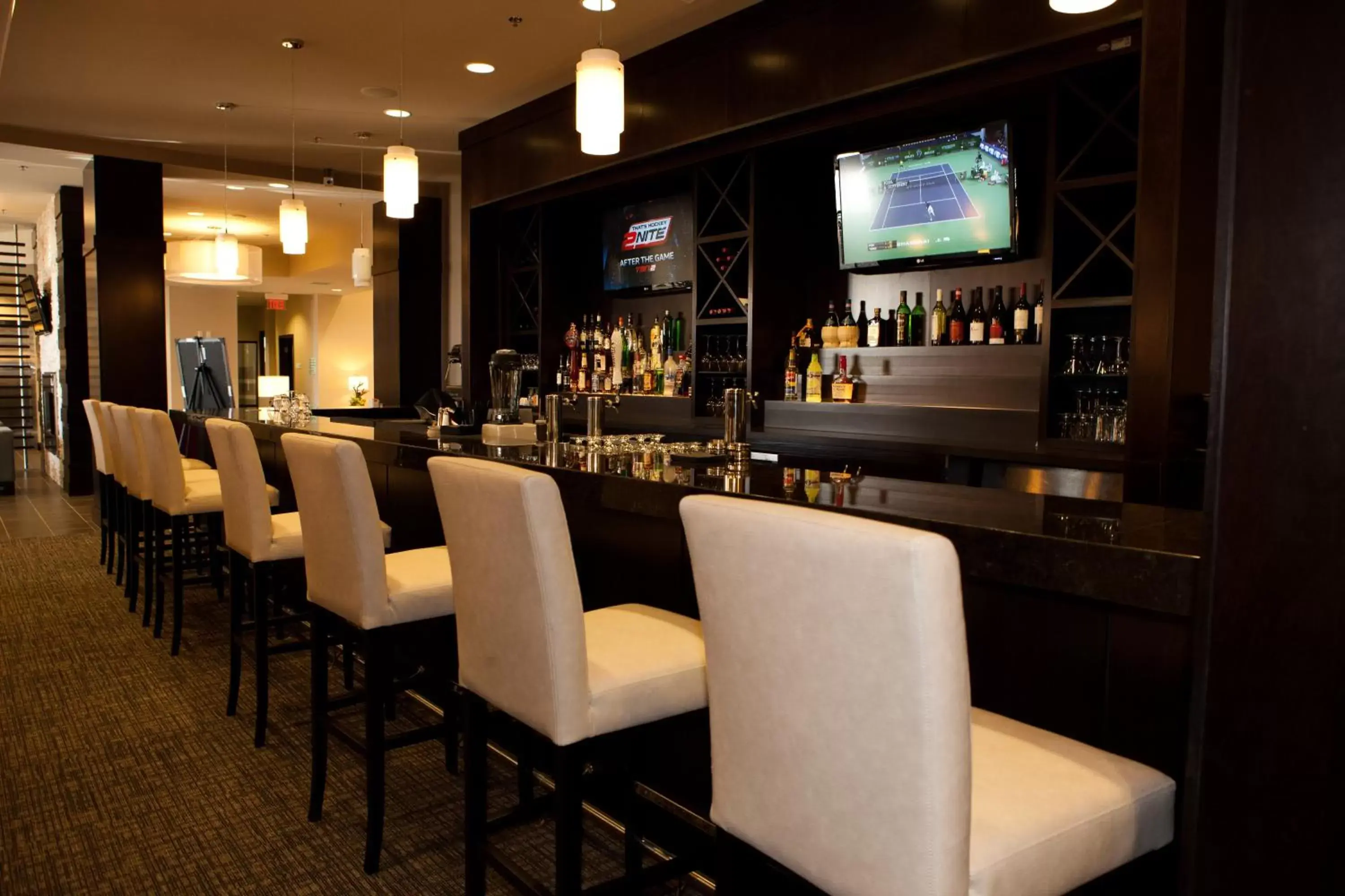 Lounge or bar, Lounge/Bar in Holiday Inn Hotel & Suites Red Deer, an IHG Hotel