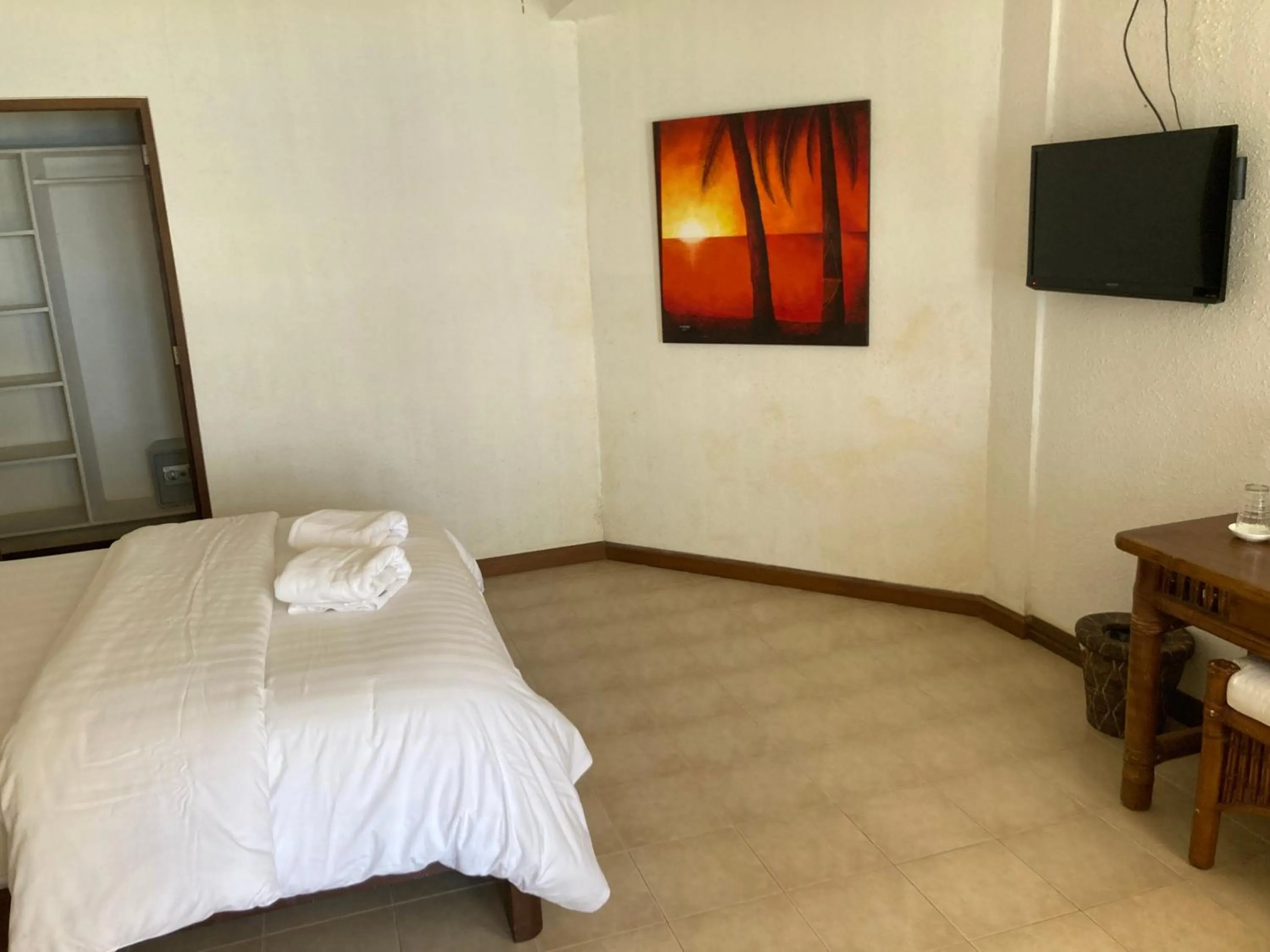 Bed in Sunset At Aninuan Beach Resort