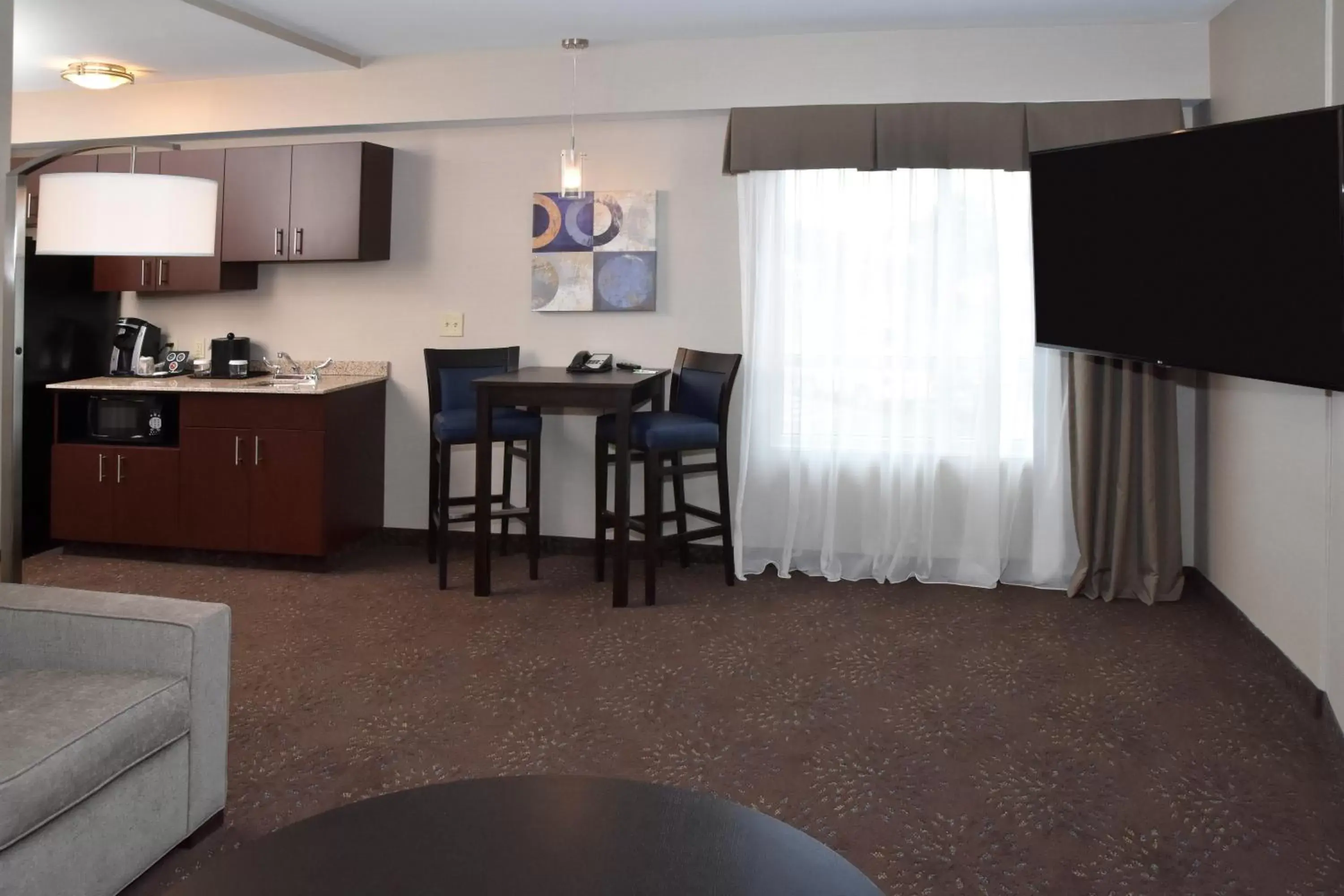 Photo of the whole room, TV/Entertainment Center in Holiday Inn Canton-Belden Village, an IHG Hotel