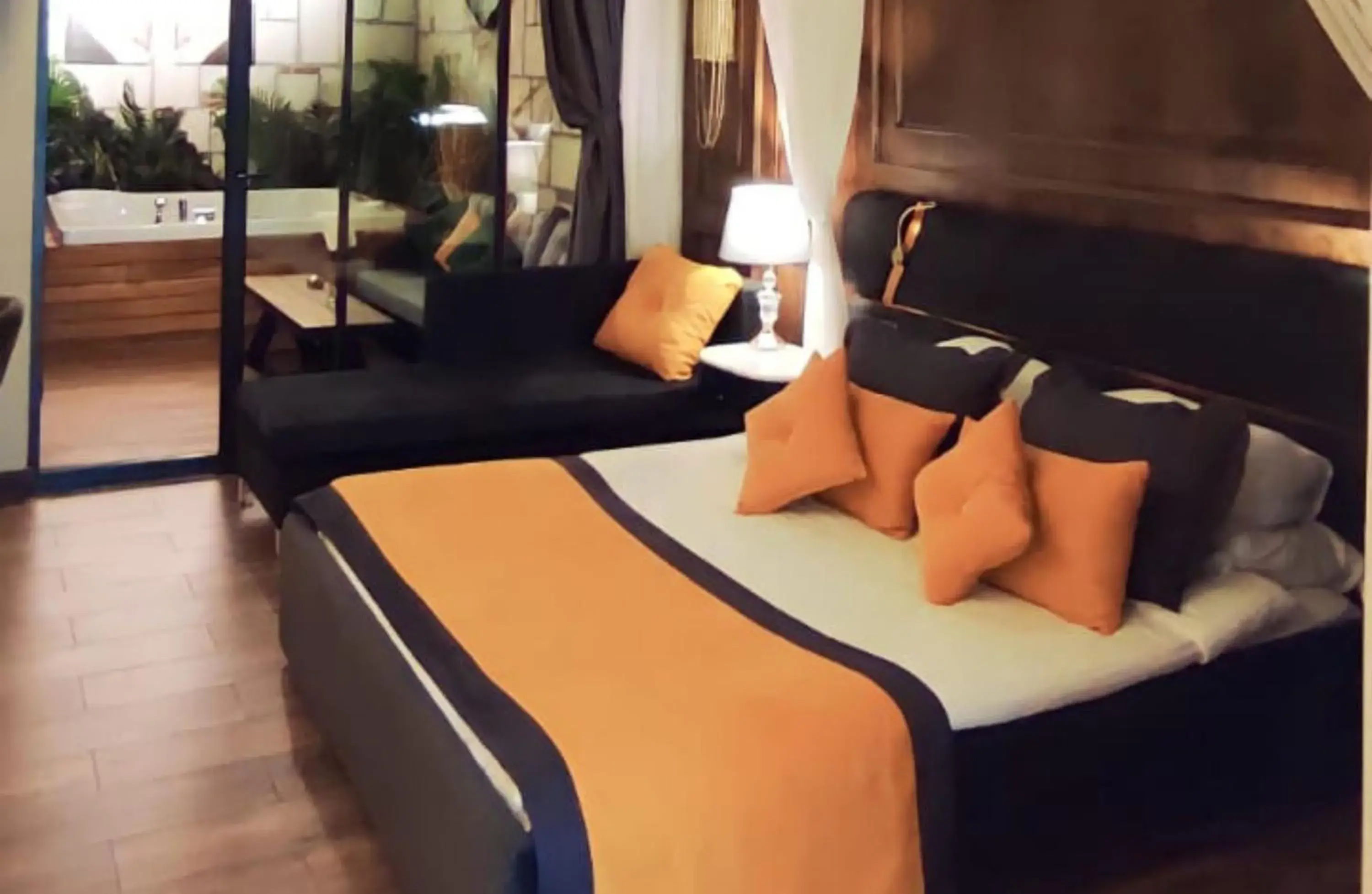 Bed in TNR BOUTIQUE HOTEL SPA