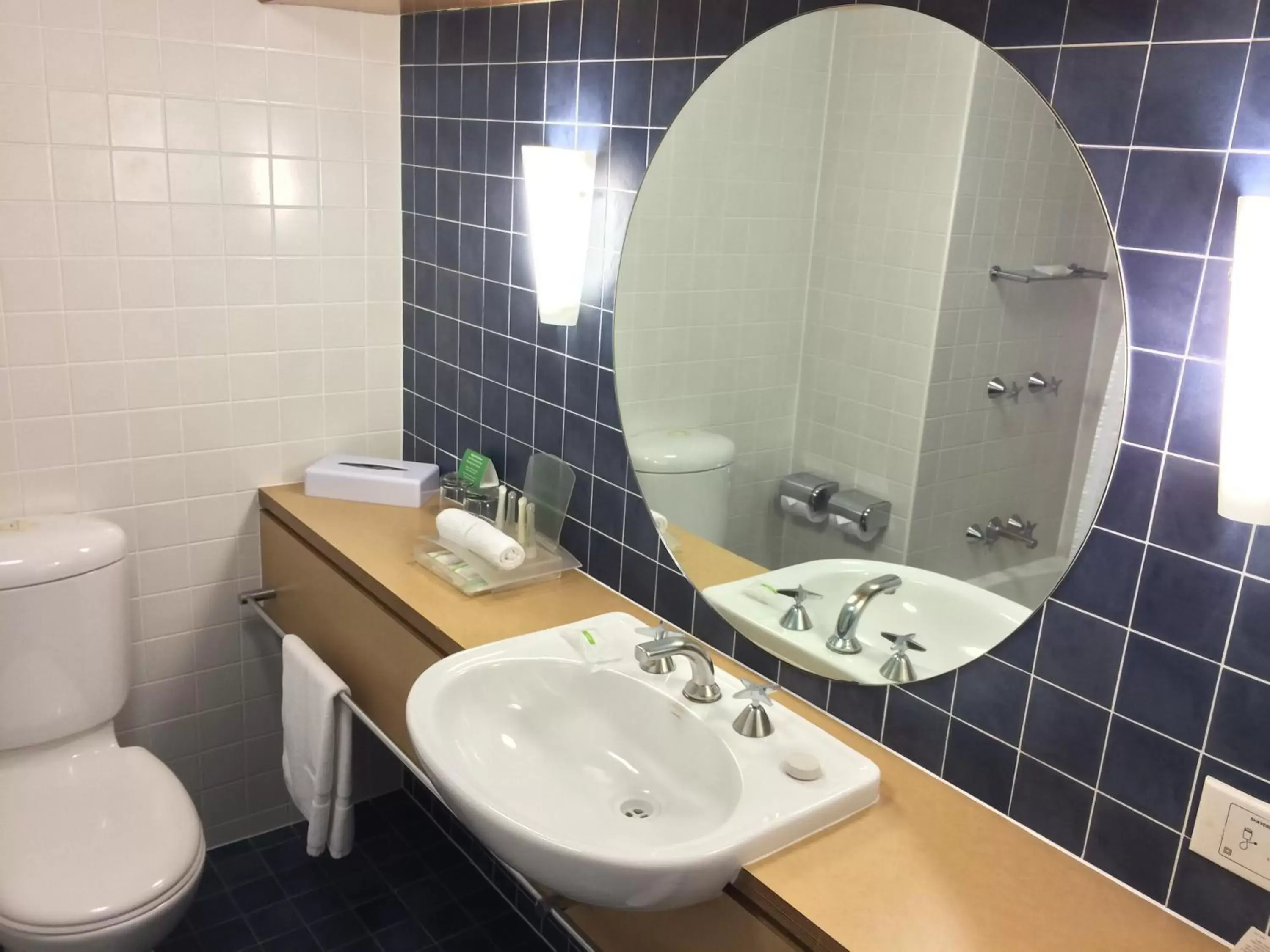 Bathroom in Holiday Inn Cairns Harbourside, an IHG Hotel