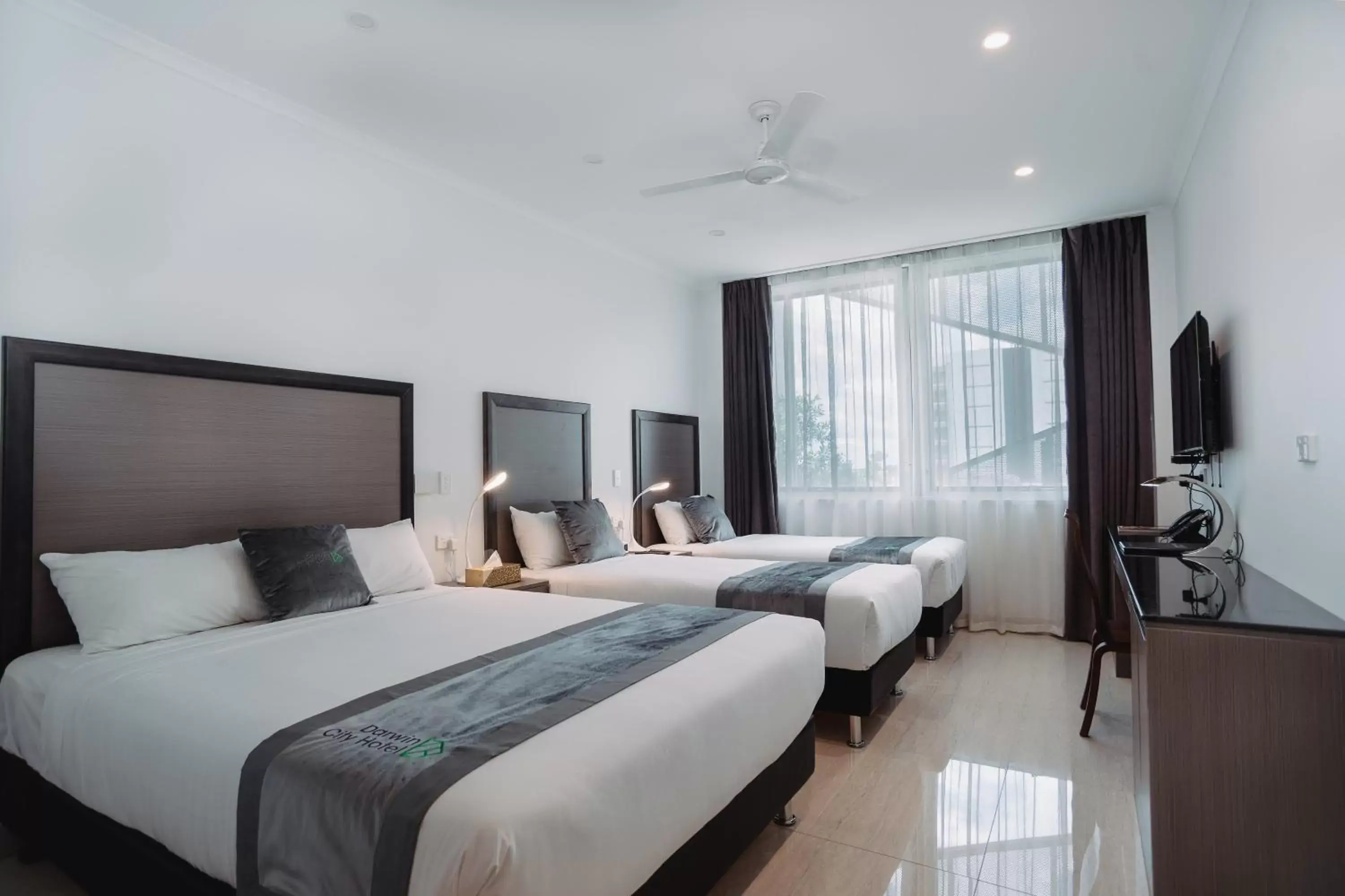 Bed in Darwin City Hotel