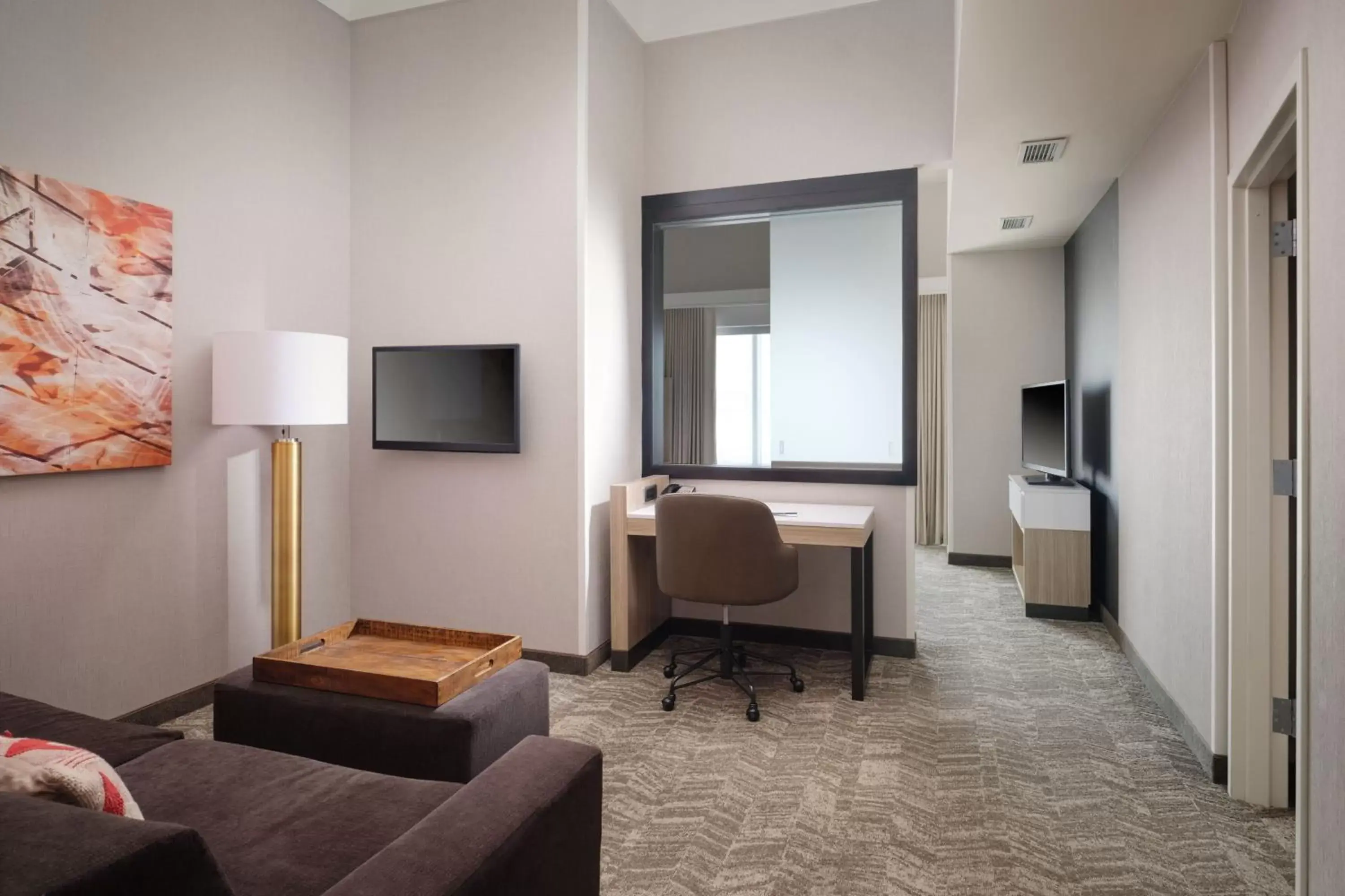 Living room, TV/Entertainment Center in Spring Hill Suites Minneapolis-St. Paul Airport/Mall Of America