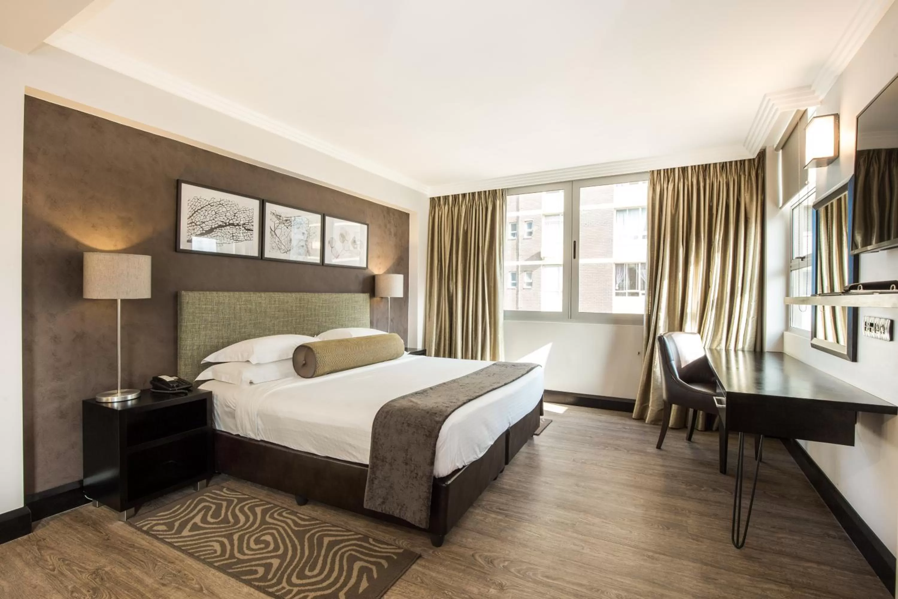 Bedroom, Bed in Belaire Suites Hotel