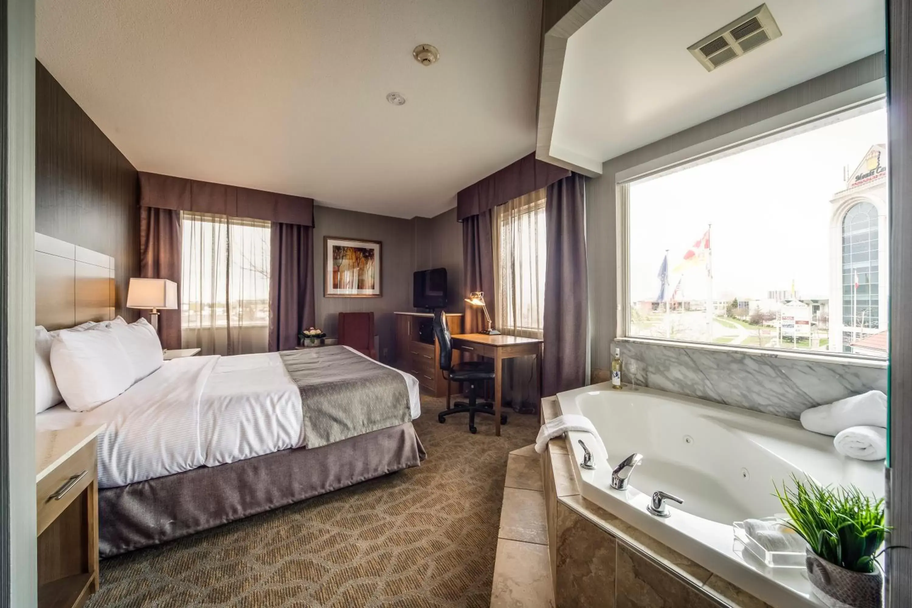 Photo of the whole room, Bed in Monte Carlo Inn Airport Suites Photo of the whole room, Bed in Monte Carlo Inn Airport Suites