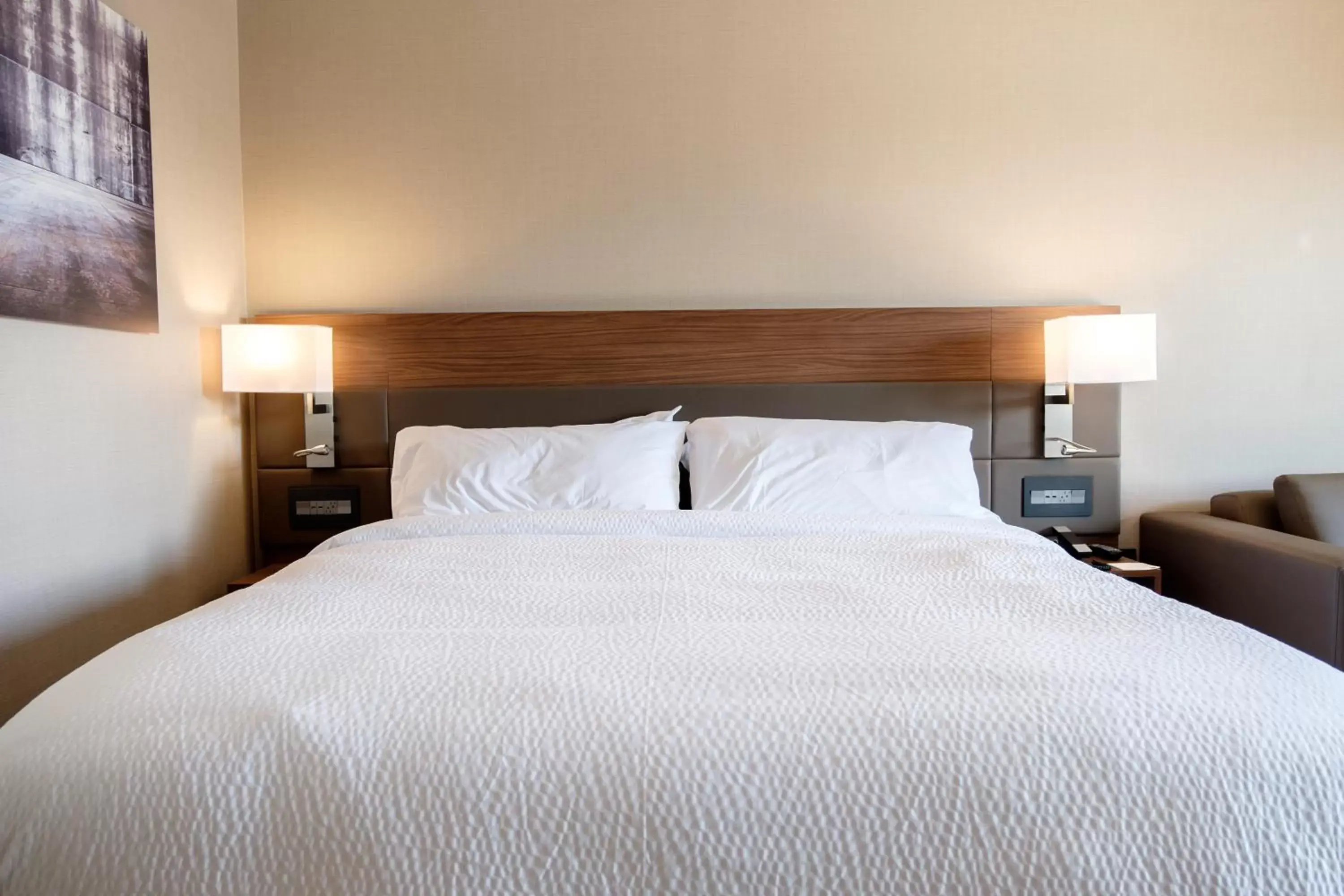 Bed in AC Hotel by Marriott Cincinnati at The Banks