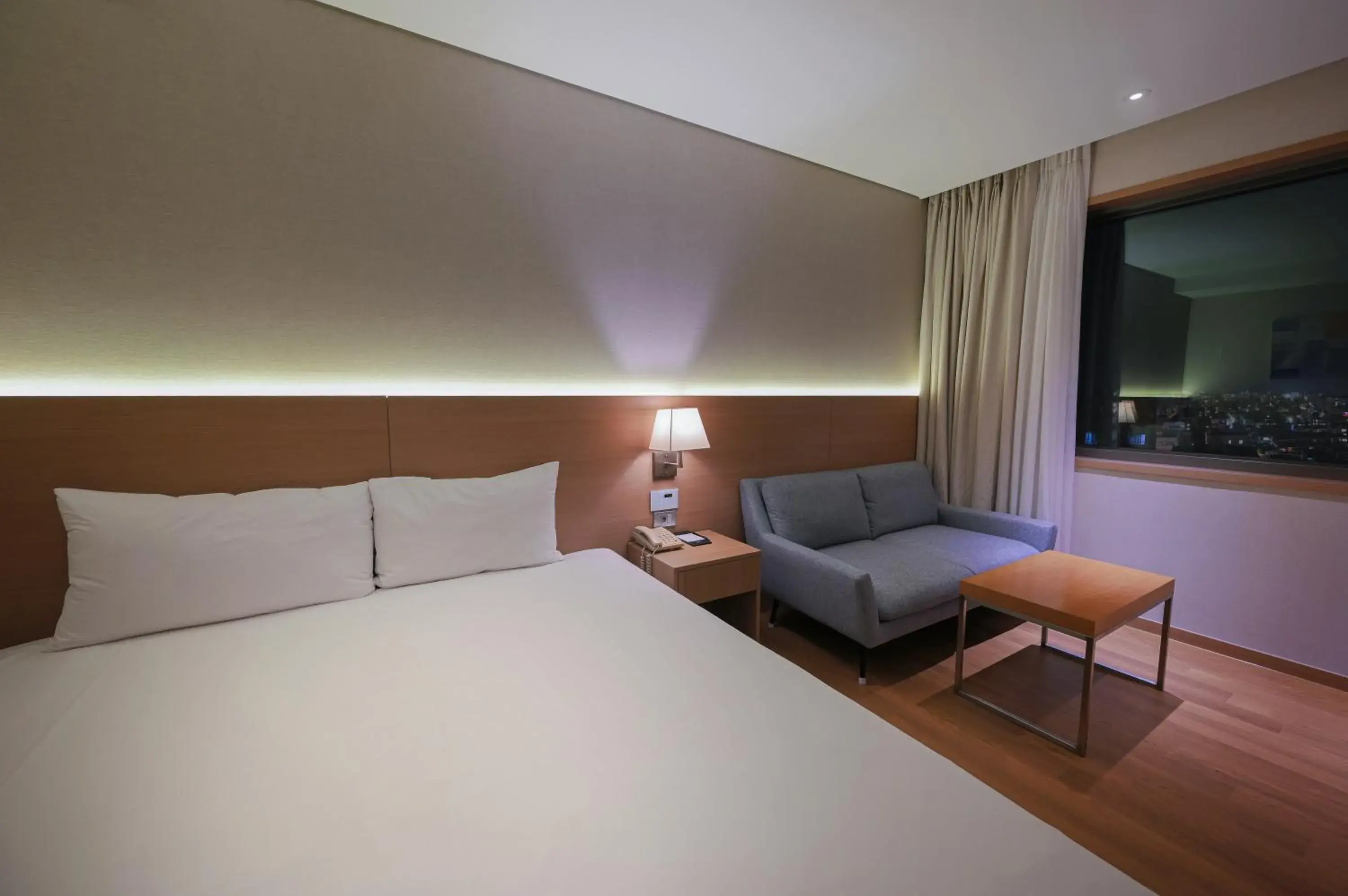 Bed in Astar Hotel Jeju