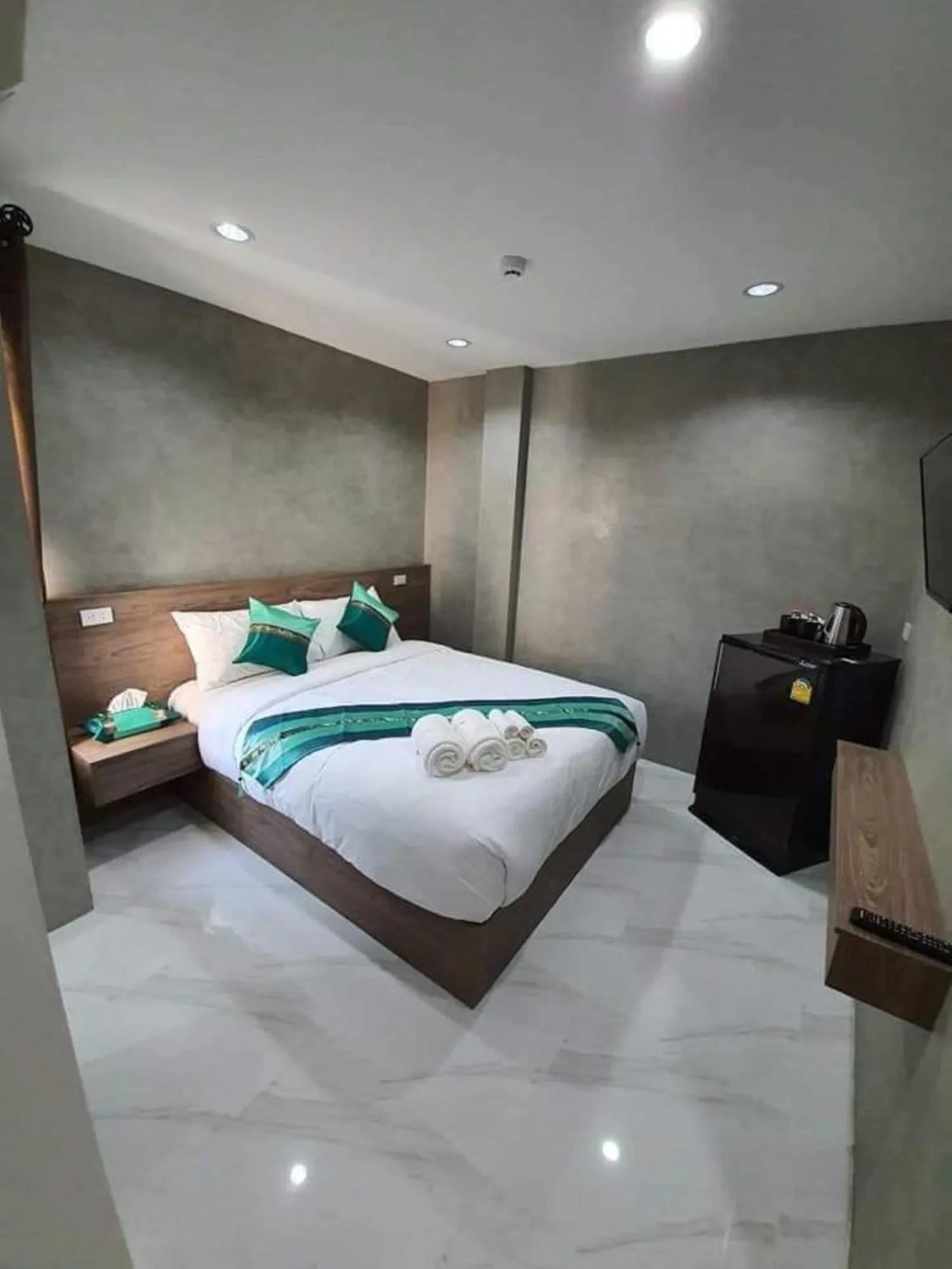 Bed in Puak Taem Boutique Hotel