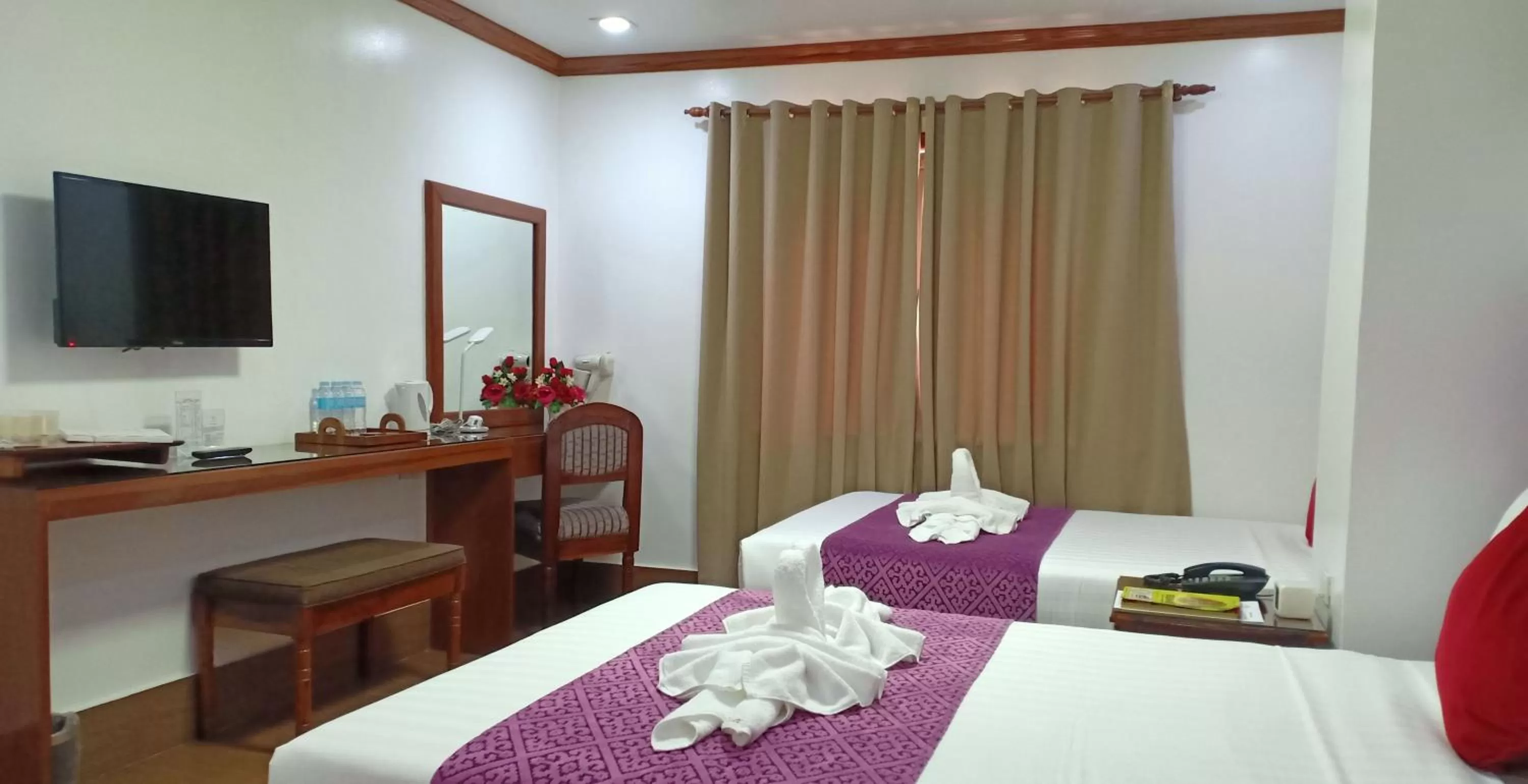 Bed in CLN Boutique Hotel