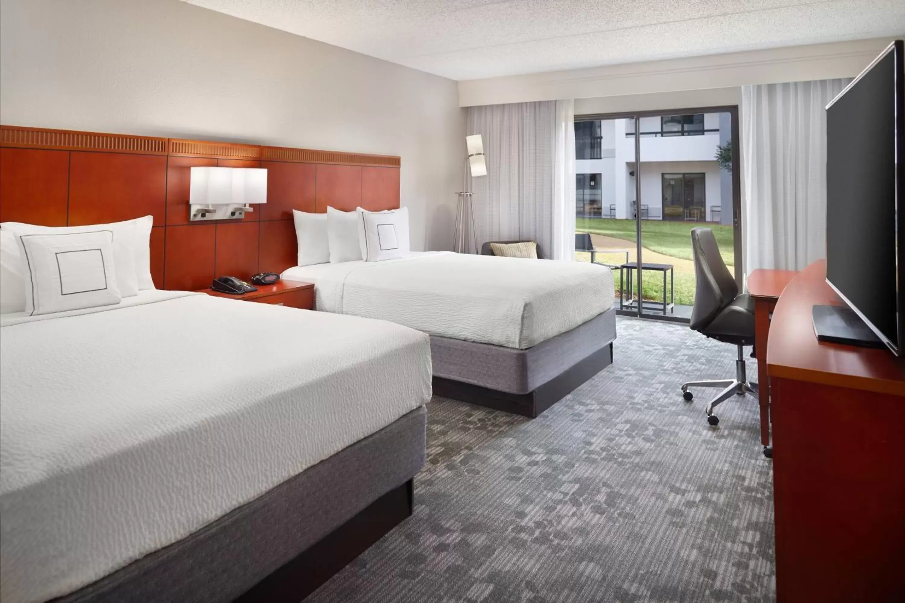 Photo of the whole room, Bed in Courtyard by Marriott Atlanta Airport South/Sullivan Road