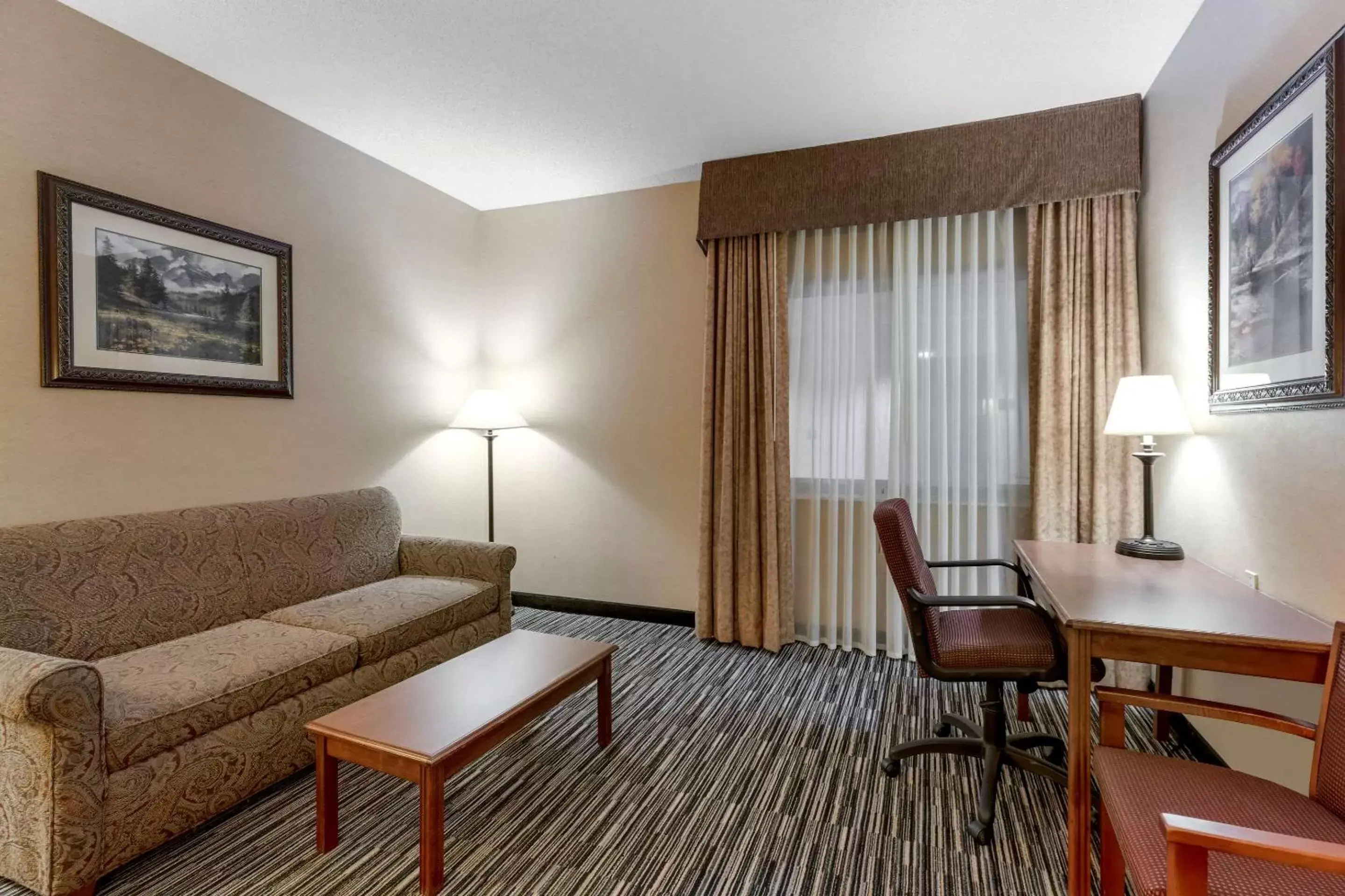 Bedroom, Seating Area in Quality Inn & Suites Wellington – Fort Collins