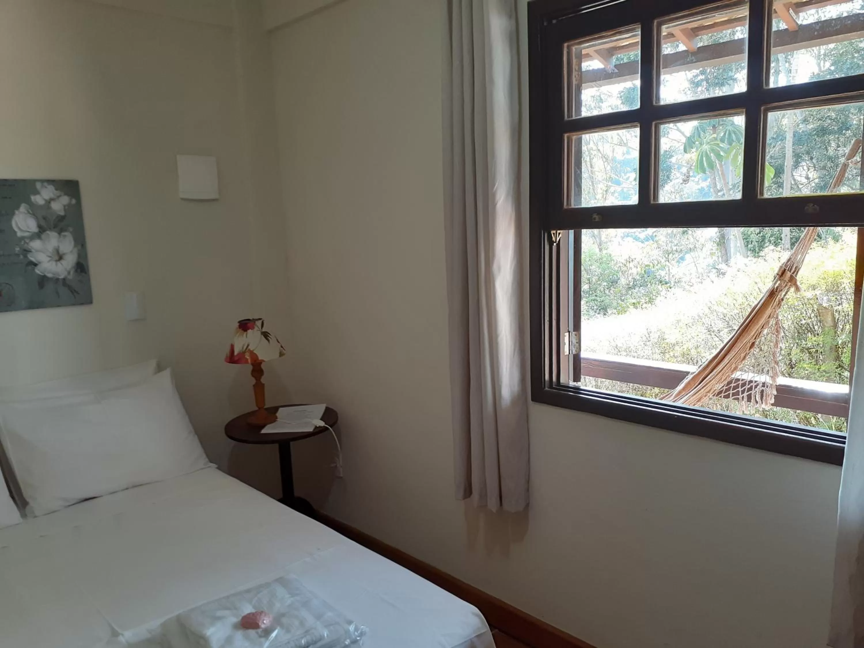 Bed in Pousada R.N.C. Nosso Paraíso