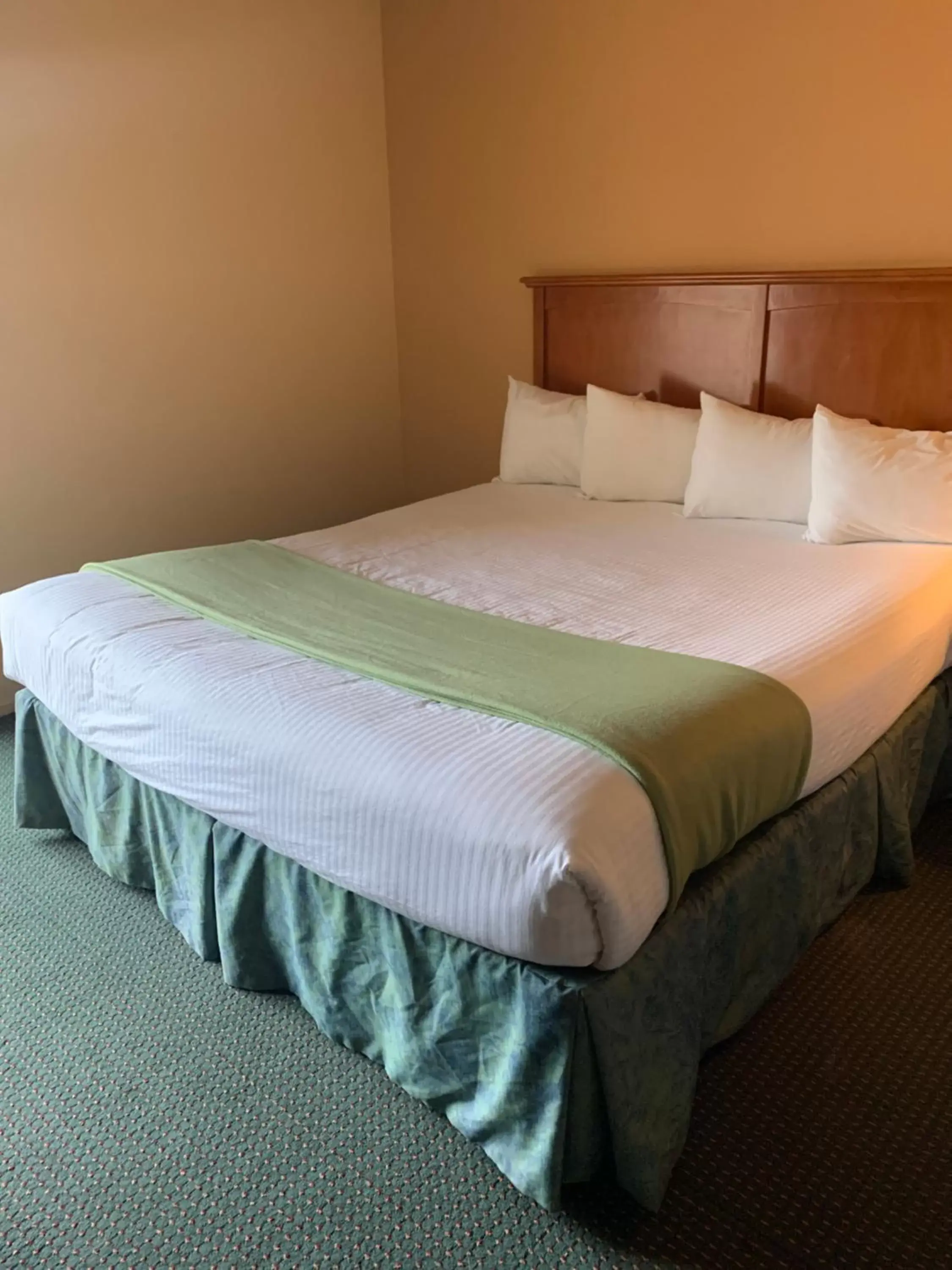 Bed in Miracle Springs Resort and Spa