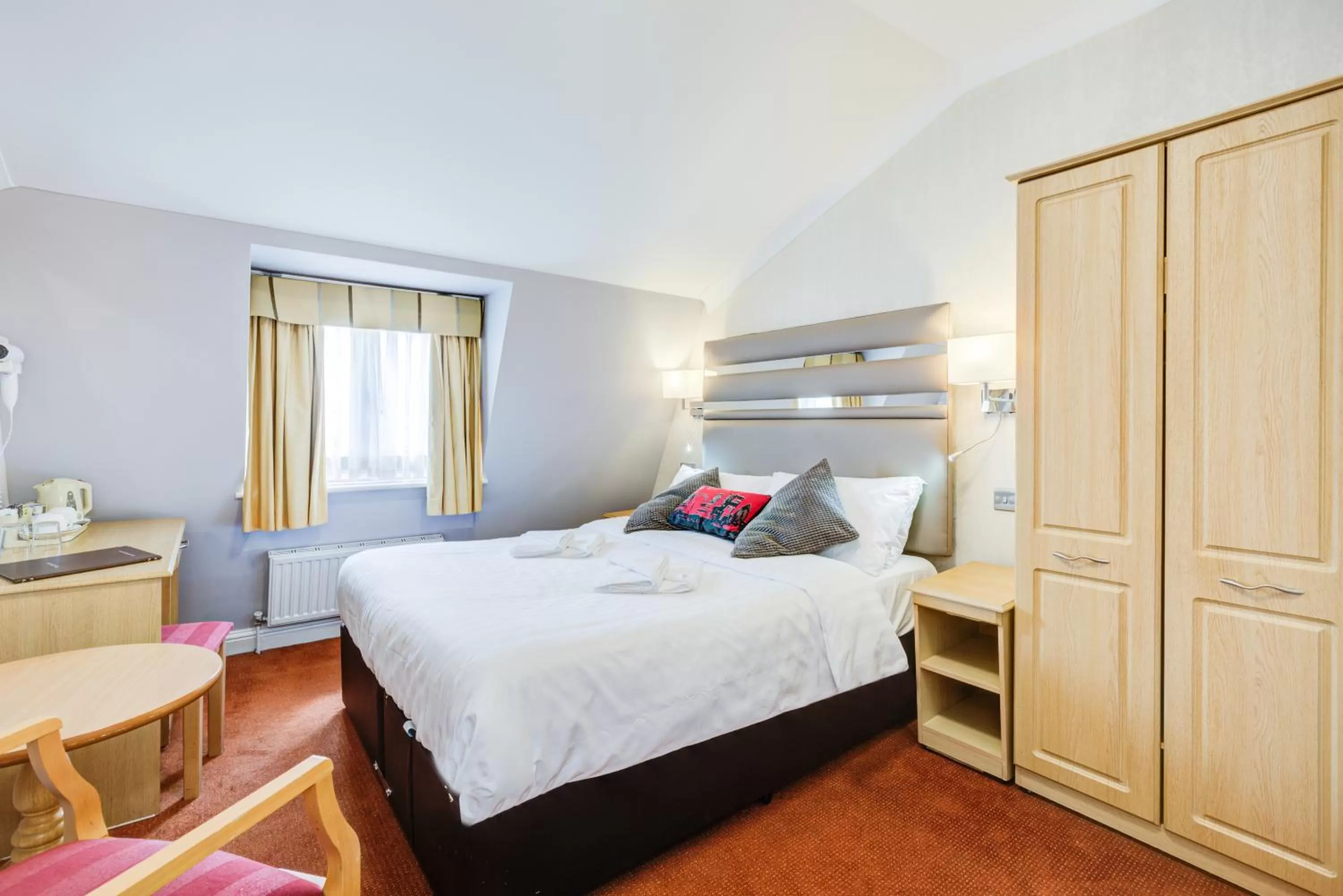 Bed in Admiral Hotel at Park Avenue