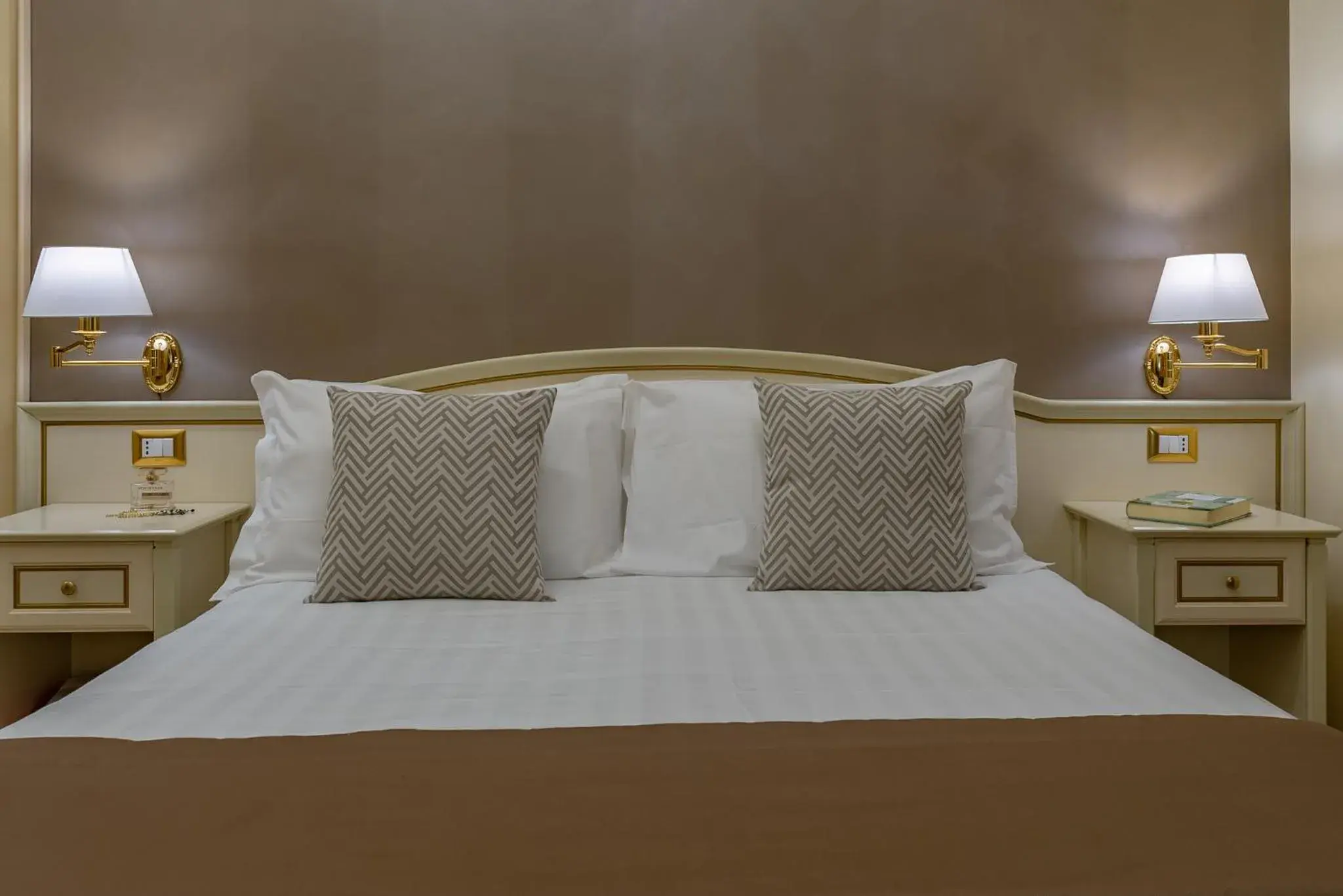 Bed in Vittorio Emanuele Boutique Hotel