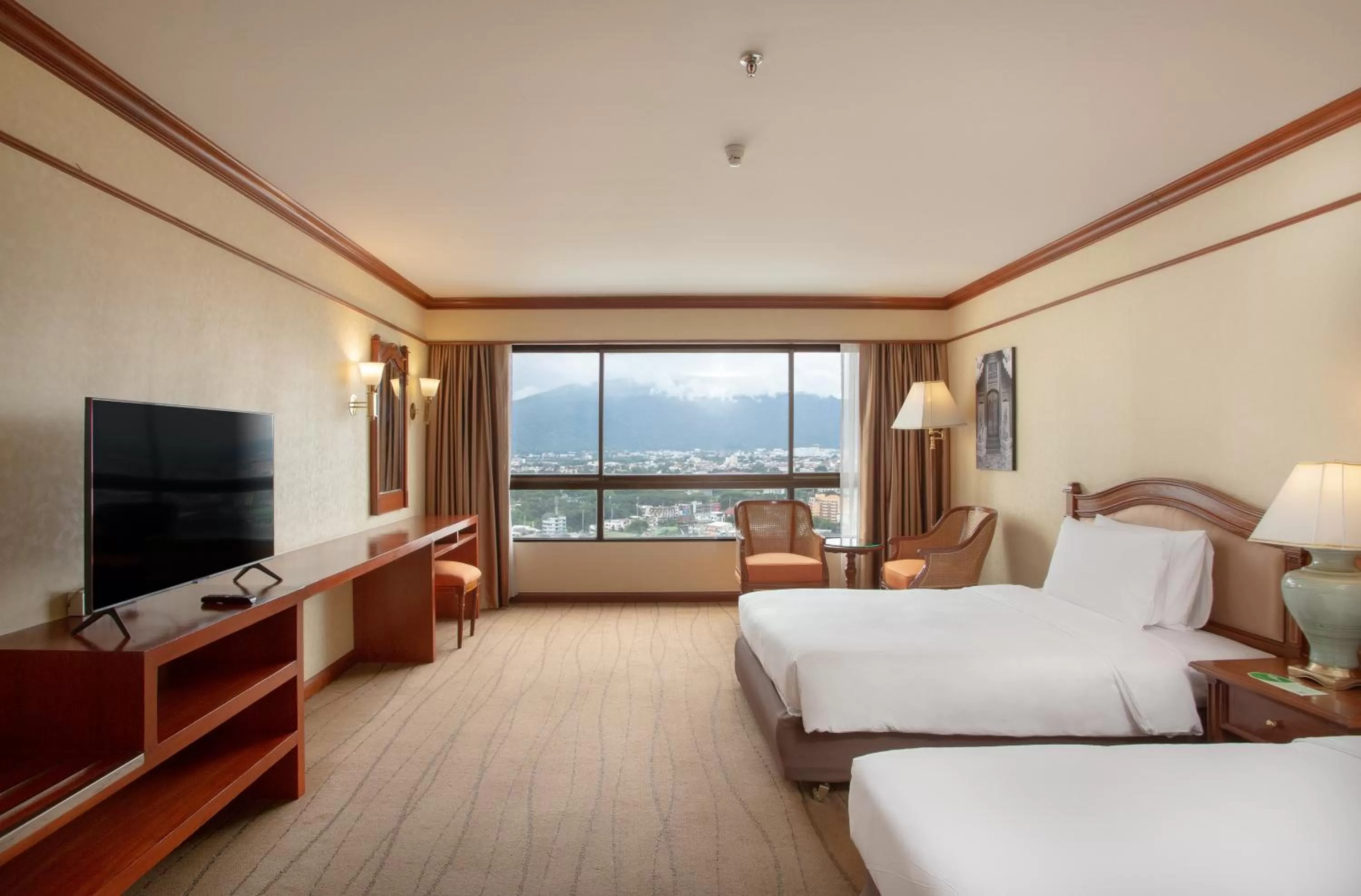 Bed in Centara Riverside Hotel Chiang Mai