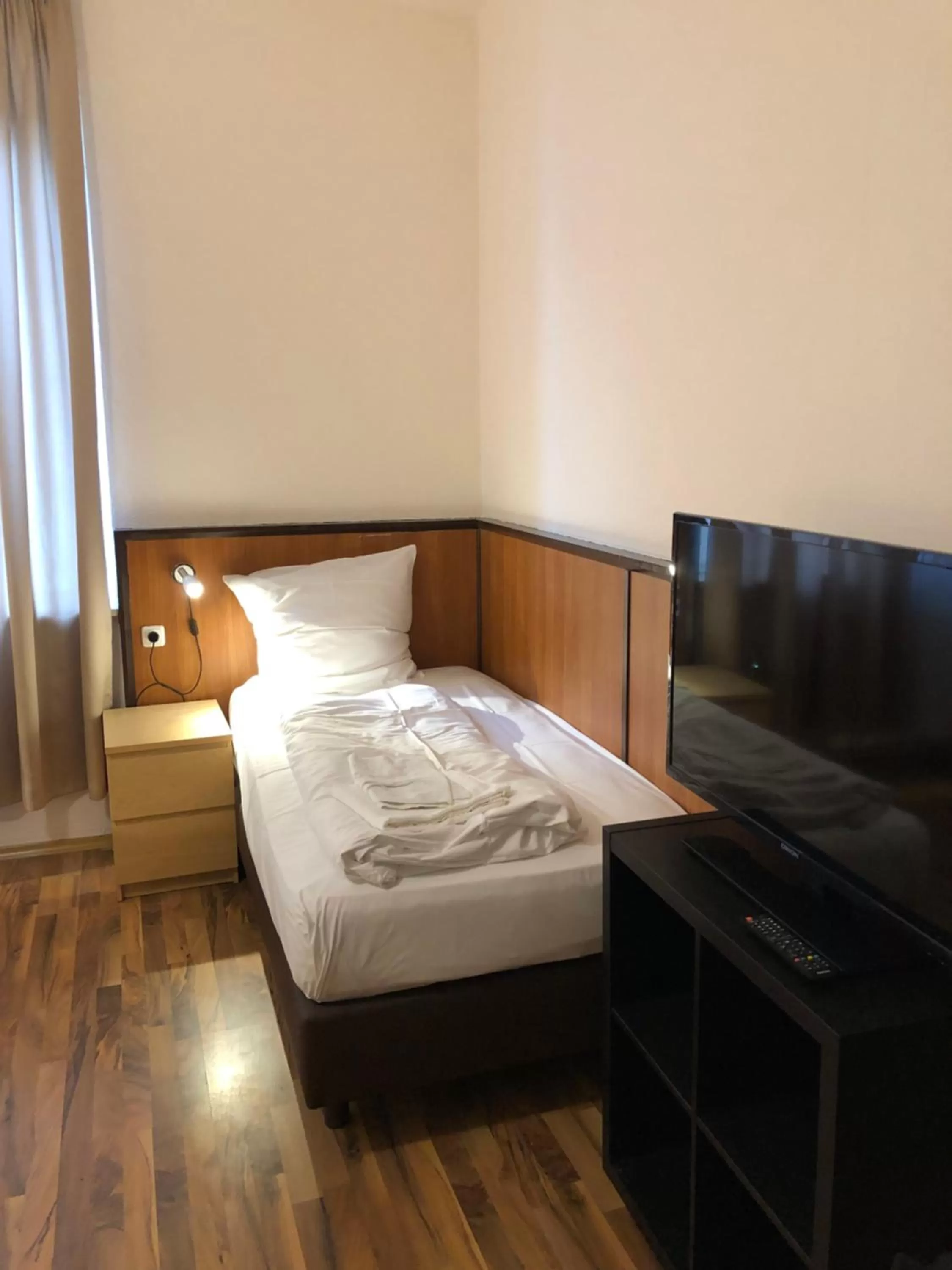 Bed in Hotel Poseidon