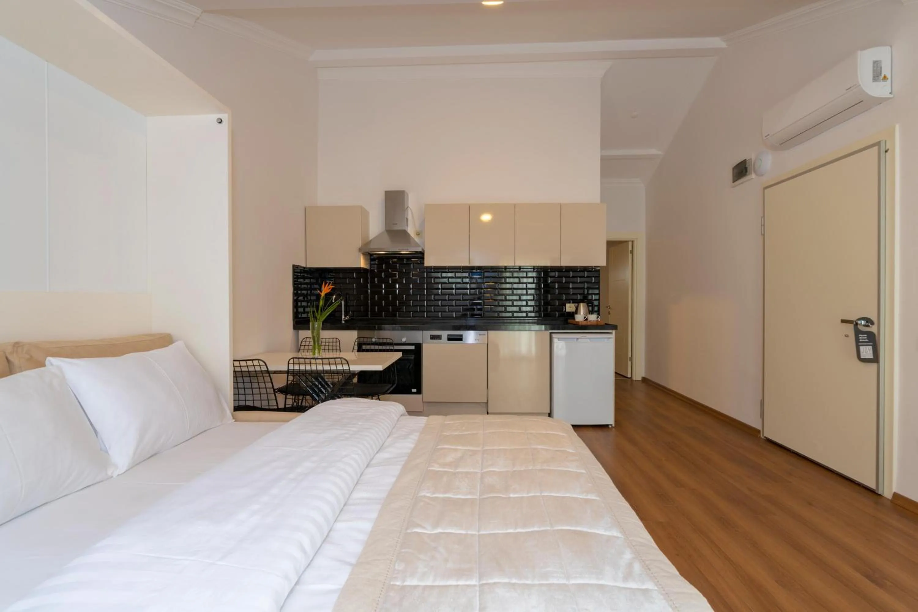 Kitchen or kitchenette, Bed in Joy Suites